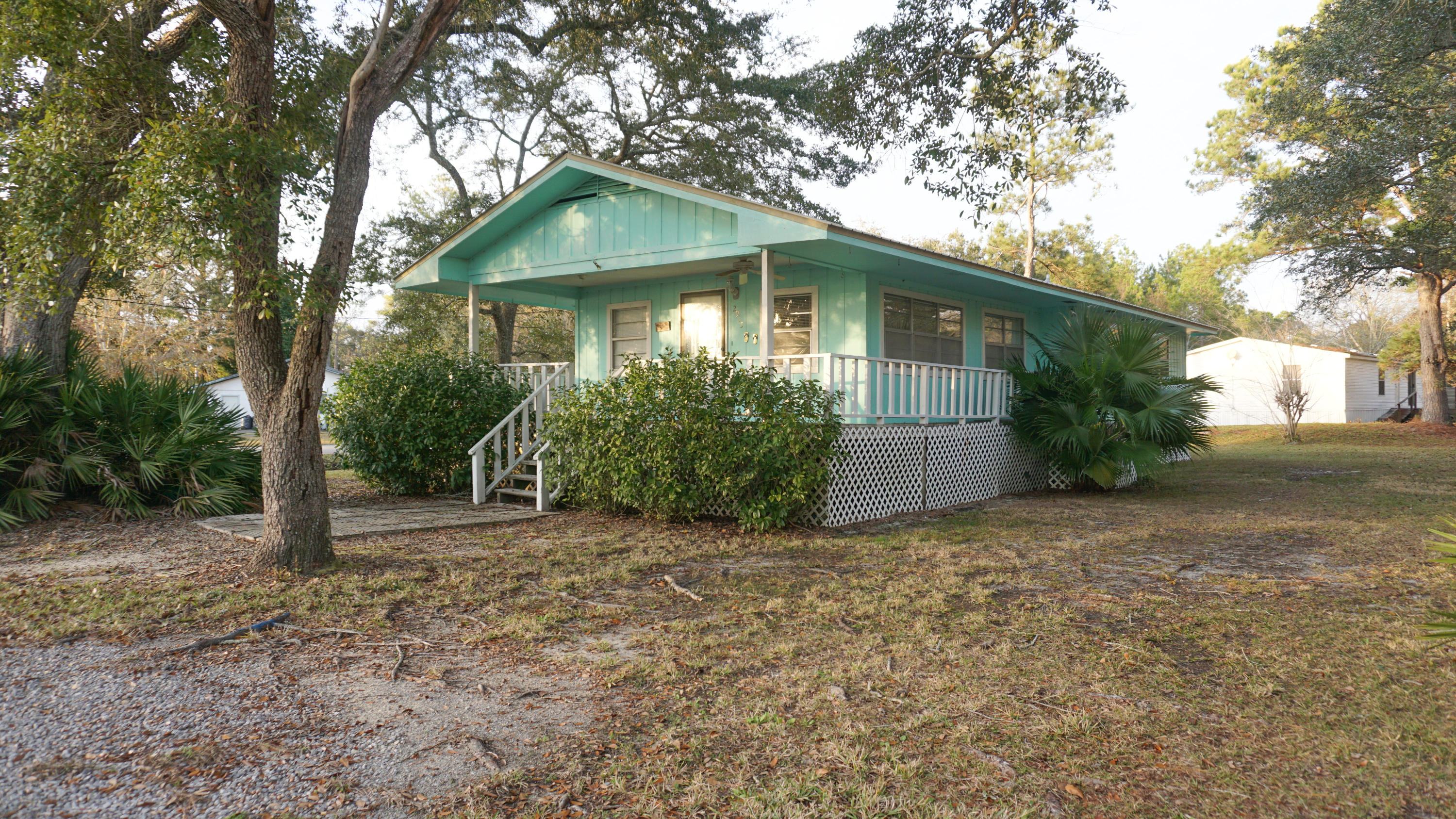 This 3bd/2ba home is situated on a corner lot and just a short distance from the beautiful beaches of South Walton. Enjoy your views of the bay from the front porch.