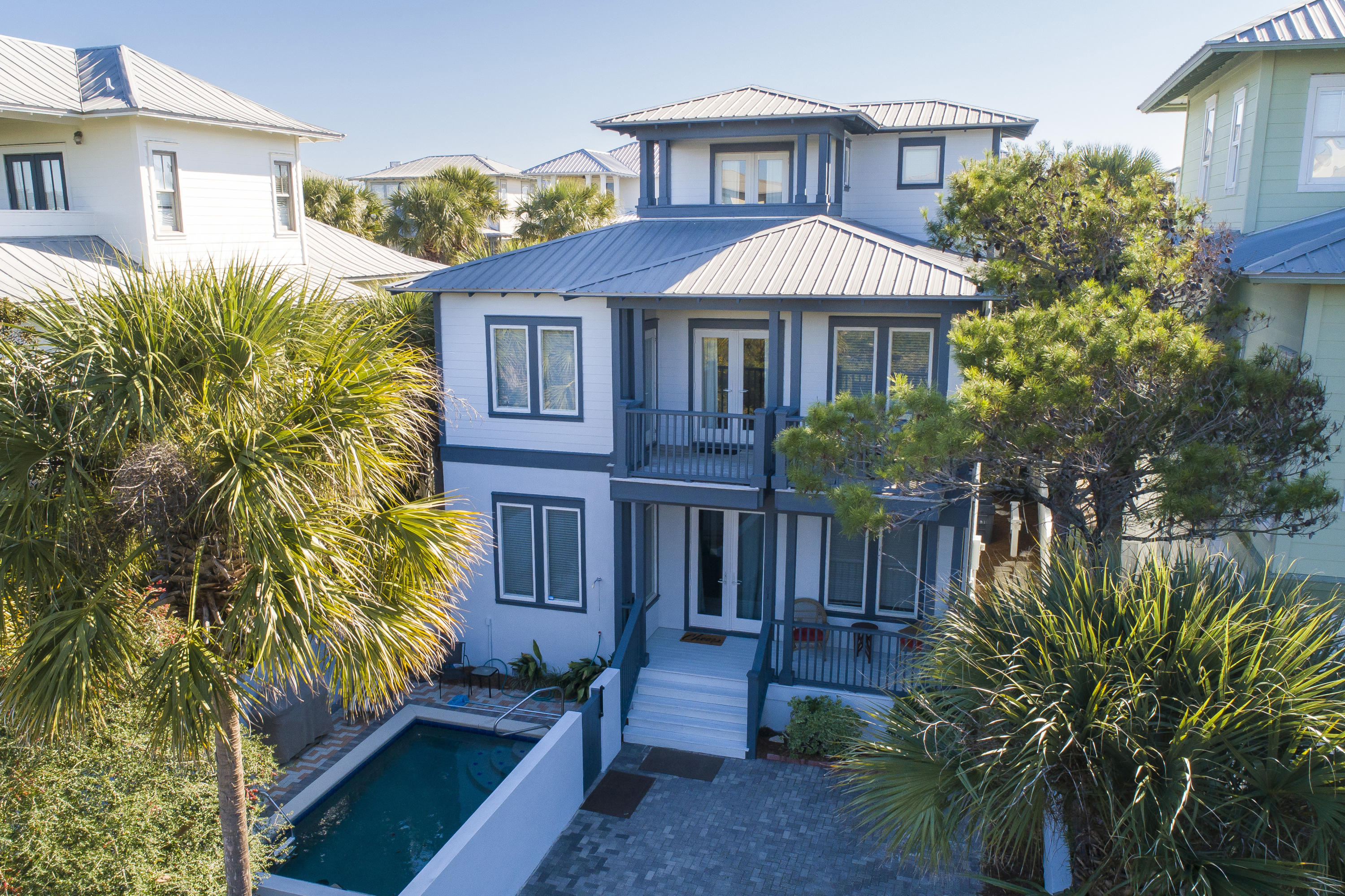 FRESHLY PAINTED South of 30A in the gated, gulf front community of Water's Edge, situated between Alys Beach and Rosemary Beach. This beach retreat is equipped with 2 bedrooms on the first floor and 3 bedrooms on the second floor, each with direct access to a covered porch with a view of the gulf. Relax in the third floor tower room and enjoy a gulf view from it's porch. Positioned on the West side of the home, the private pool is a great spot so soak up the late afternoon sunshine! Very well maintained, this home is in pristine condition and ready for you to enjoy. The home's proven rental income make it a great investment opportunity. Schedule your private viewing of this home today!