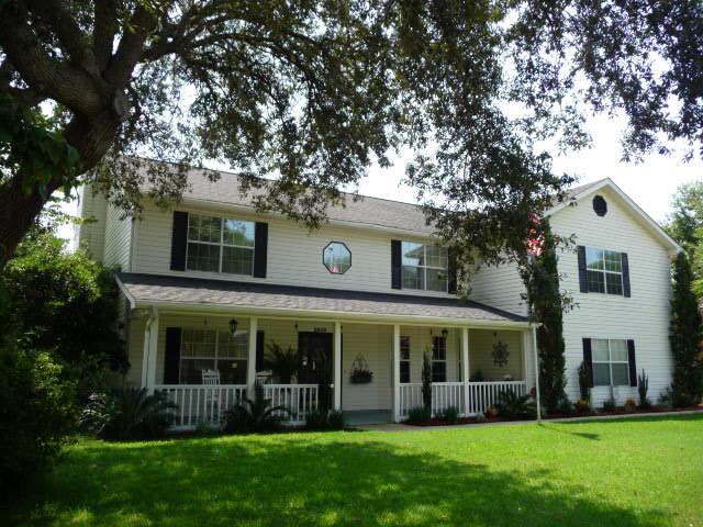 $14,000 price drop. Large/well maintained 5 bedroom/3 full bath family style home in Shalimar/Lake Pointe. Top location/close to everything: Eglin AFB, Hurlburt AFB, schools/churches/recreation/ (golf/marinas), & Destin's world class beaches. Fenced back yard. Nicely landscaped. Sparkling salt water pool (32' x 16') with energy saving pump. 2 heating and cooling systems, and newer/efficient heat pump water heater. Oversized garage with added 15'x 14' workshop! Kitchen has center island, granite counters & stainless steel appliances. Family room off kitchen with fireplace. Formal living & dining rooms too! Large enclosed sunroom overlooking pool area. Long/wide driveway for rec vehicle parking. Home has lots to offer. Seller will pay up to $5,000 of buyer's closing costs. See it today!!