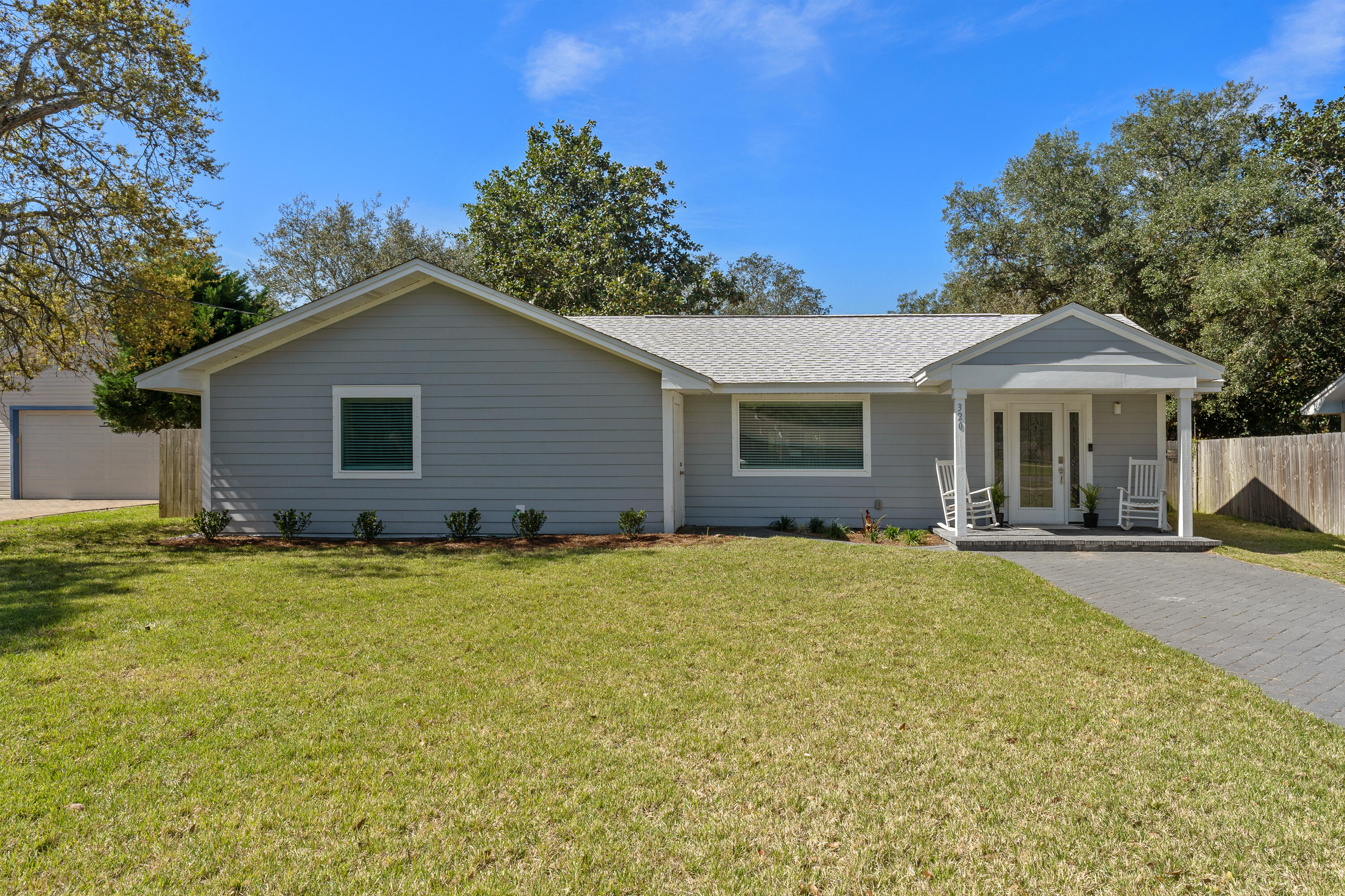 Discover refined coastal living in this updated 3 bed, 2 bath home in Destin, FL. Impeccably renovated with tile throughout, quartz countertops, and stainless steel appliances, this residence exudes modern elegance. The kitchen has a stunning quartz waterfall countertop on the island, perfect for gatherings. Enjoy the bright and airy ambiance throughout, accentuated by natural light. Step outside to a screened-in back porch overlooking the spacious fenced backyard, an ideal setting for entertaining or relaxation. With its impeccable finishes and inviting atmosphere, this home offers the quintessential Florida lifestyle.