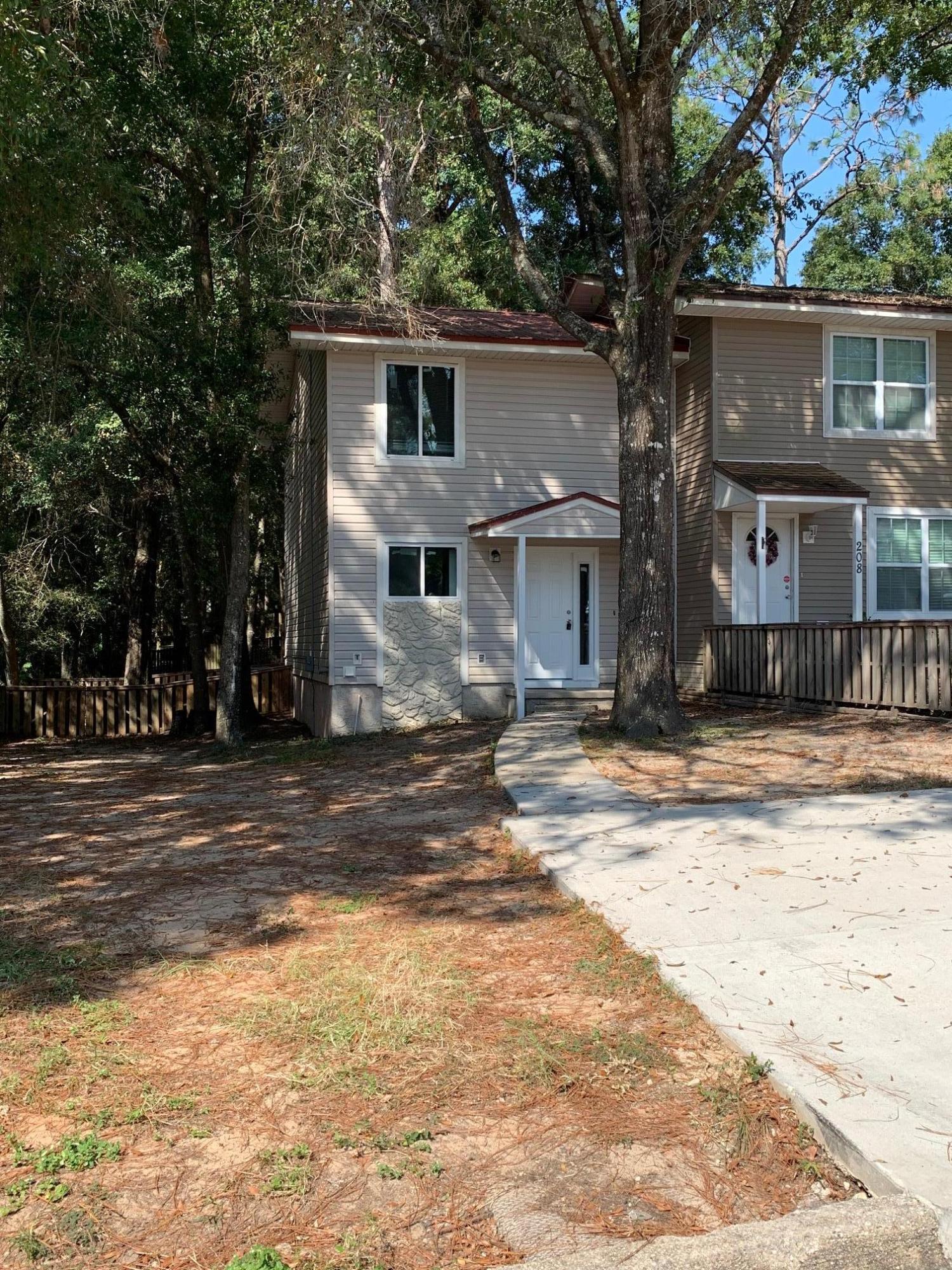 Brilliantly renovated 2-bedroom 1.5 bath home less than 15 minutes from Duke Field and 7SFG. The first floor has seamless luxury vinyl flooring throughout. The spacious kitchen features beautiful granite countertops and is loaded with brand-new stainless-steel appliances. The kitchen boasts a large breakfast bar that opens up to the dining area and large living room. The first floor also has a half bath and laundry. The 2 bedrooms have brand new carpet. Both bedrooms are very large with nice sized closets. The full bathroom upstairs has a new oversized vanity and a brand new bathtub!