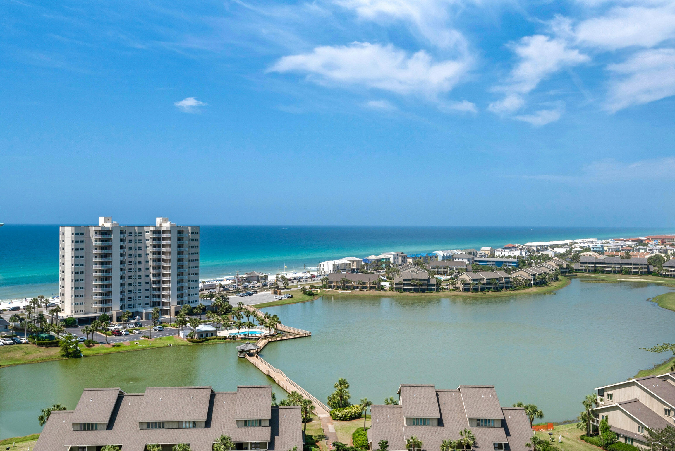 Located on the 14th floor of Ariel Dunes II at Seascape Golf & Beach Resort, this unit offers spectacular views of the Gulf. From the spacious private balcony, take in the sights of miles of coastline. The kitchen features granite counter tops, solid wood cabinetry, and a breakfast bar. New wood plank tile flooring has been installed in the bedroom and living area. The unit also has built-in hallway bunks, stackable washer/dryer, and 9-foot ceilings. Enjoy the private gym and pools that are part of Ariel Dunes. Here you're also part of Seascape Resort, a perennial favorite of visitors. Within its gates you will find an 18-hole golf course, tennis facilities, conference center, 2,000 feet of beach frontage, shopping, entertainment, and restaurants at the Towne Centre, and more. Paradise!