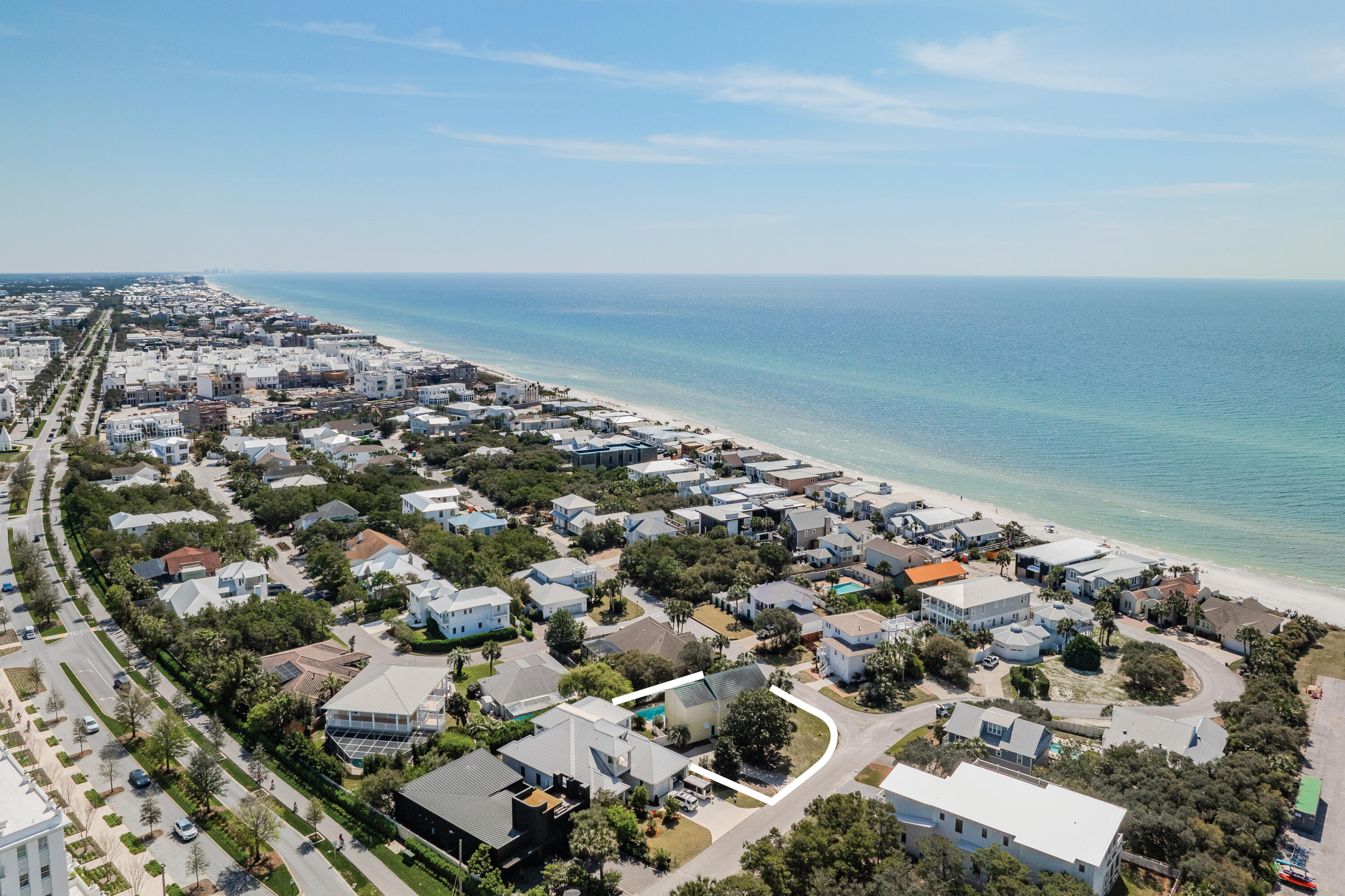 Build your dram home or remodel. Rare opportunity to purchase a home on one of the largest lots in Sand Cliffs - ALMOST a 1/4 acre (.23 acre). Sand Cliffs on the Gulf is ideally situated on the south side of 30A at the intersection of WaterSound Parkway and 30A. Gated. No rentals. Mature trees. Large pool and pool deck. Listen to the Gulf waters three houses from the Gulf of Mexico. The home needs work. The buyer is someone who values privacy and a quiet beach community.