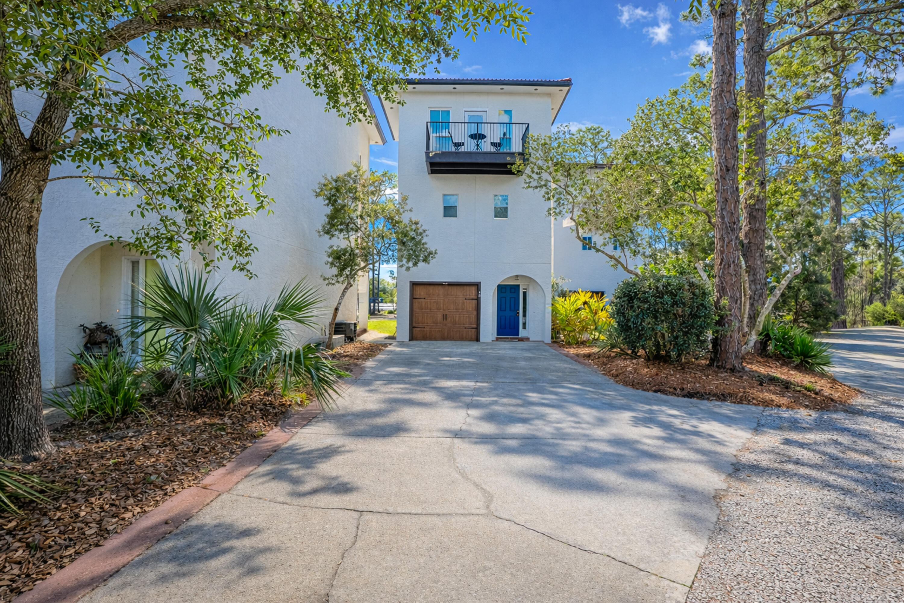 REDUCED PRICE & NEWLY UPGRADED FIRST FLOOR! This elegant and serenely situated home, nestled by Tresca lake and a nature preserve is an idyllic getaway or full time beach home.
Mar-a-Lago consists of 14 mediterranean villas with coastal dune lake and gulf views. There are plenty of beach and water activities such as kayaking, snorkeling and hiking just to name a few. Just a short walk to the sugar sand beaches and Eastern lake yet miles away from the hustle and bustle of life. 
This lovely home features an open floor plan with a gourmet kitchen and living room with a large patio, perfect for entertaining or relaxing after a day on the beach.
The third floor master bedroom offers idyllic views, private patio and a private en suite bathroom. This home is conveniently situated near bike paths, shopping, dining and entertainment.