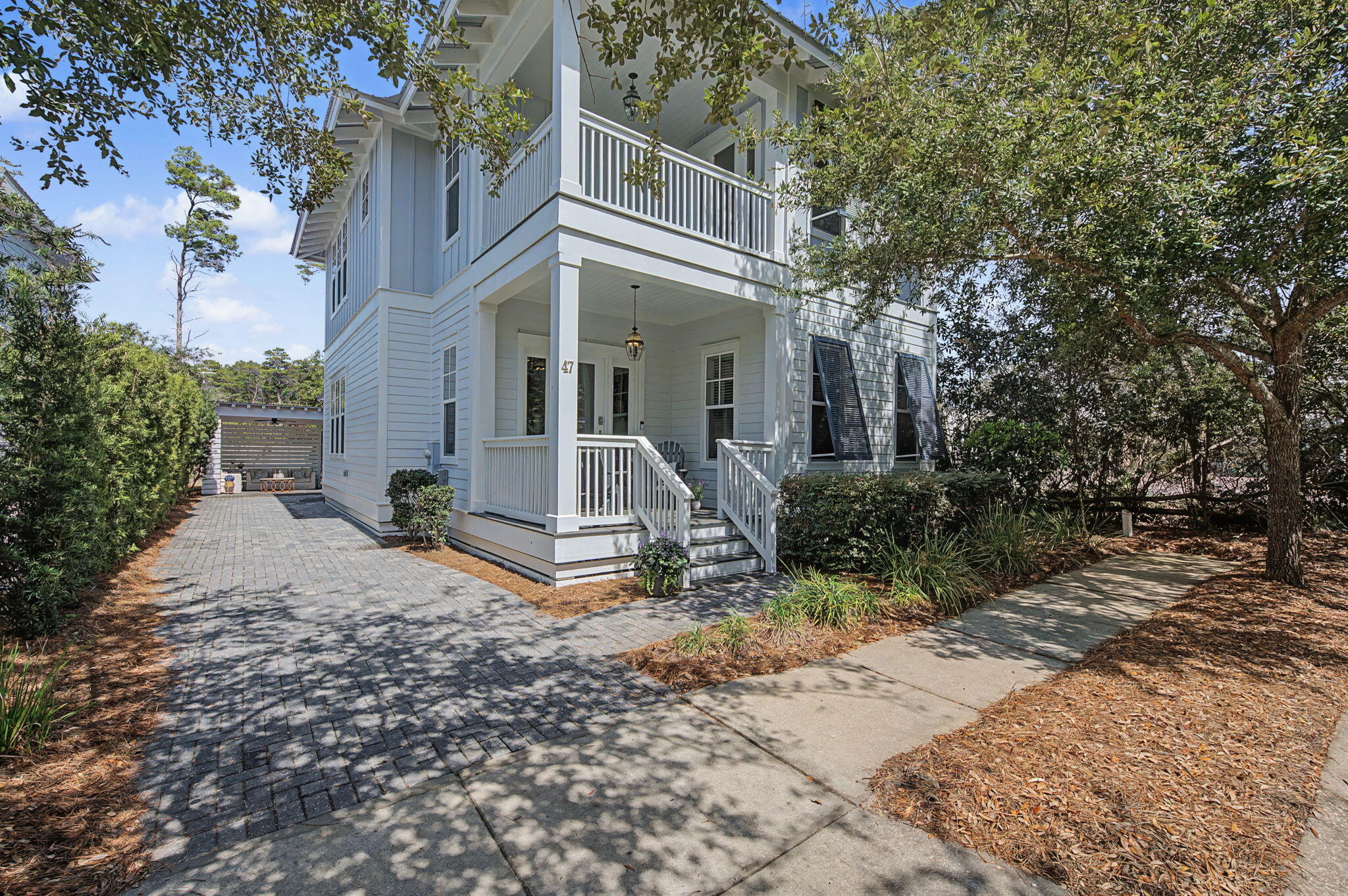 Incredible opportunity to own the perfect beach house in Greenway Park, a quaint gated neighborhood of coastal cottages with beautiful manicured oak tree-lined brick paver streets, perfectly located along 30A between Seaside and Rosemary Beach,and just minutes from Seagrove's newest beach access at Eastern Lake Road.This charming 4 bedroom,3.5 bath home located on a quiet cul-de-sac is over 2400 sq. ft with spacious rooms to relax and enjoy the comforts of upscale living with features such as upstairs and downstairs primary suites,soaring ceilings, abundant natural light,real hardwood floors, craftsman framing and crown molding, shiplap accents,designer lighting, custom cabinets,quartz countertops,stainless steel appliances,gas stove, beautiful bathrooms,an incredible outdoor living space and more. Downstairs, you are greeted by a welcoming porch and light-filled entryway. The bright primary bedroom features an ensuite bathroom with double sinks, quartz counters, built-in shelving for linens, and a tub/shower combination adorned with designer tile, along with a half bathroom nearby. The open floor plan flows into a comfortable living room offering plenty of seating, dining room and stunning gourmet kitchen featuring sparkling white marble counters, intricate marble backsplash, stainless Kitchenaid appliances, gas stove, a large apron sink, pullout trash drawer and plentiful cabinets and counter space along with a large island for entertaining.

The living room, dining room, and kitchen, framed by walls of windows, seamlessly connect to a stunning outdoor living space. Family and friends can gather at the bar to chat with the cook in the covered outdoor kitchen, wet bar and BBQ area, lounge on the sofa and chairs with a refreshing lemonade, or enjoy a meal at the dining table. As night falls, everyone can come together around the fire pit, illuminated by charming bistro lights, creating the perfect spot to unwind after a long day at the beach.

Upstairs is a second primary bedroom suite with a separate sitting room that could also serve as an office, gym, or nursery, and ensuite spa-like bathroom with double sinks, quartz counters, and a walk-in shower. On this floor is also another guest bedroom with a private balcony, a cute bunk bedroom and a 3rd luxury bathroom with double sinks and walk-in shower. Storage is plentiful inside the home as well as in the attached shed, so no need to compromise.

Beyond the home itself, the community offers an array of amenities to enrich your lifestyle. Take a refreshing dip in the community pool which is heated during the early Spring and late Fall months, explore nature trails in the bordering Point Washington State Park, or paddle through the tranquil waters of Eastern Lake. Just outside the gates, Greenway Station, 30A's newest lifestyle center, awaits with a vibrant mix of boutiques, art galleries, coffee shops, and restaurants. Start your day with coffee and a pastry at Turbo Coffee, indulge in a hearty breakfast at Canopy Road Café, enjoy tacos at Local Cantina, or savor Mediterranean flavors at Wild Olives Bistro. Within a few blocks is Perfect Pig, Old Florida Fish House, Steamboat Grill and Buddy's Seafood Market. Seaside is a short bike ride away where you can enjoy shopping, delicious food, music, and farmers' market. This lovely home is offered fully furnished and would make a wonderful primary, secondary or lucrative investment beach home. Please inquire for more details on potential income, ownership costs and to schedule a tour.