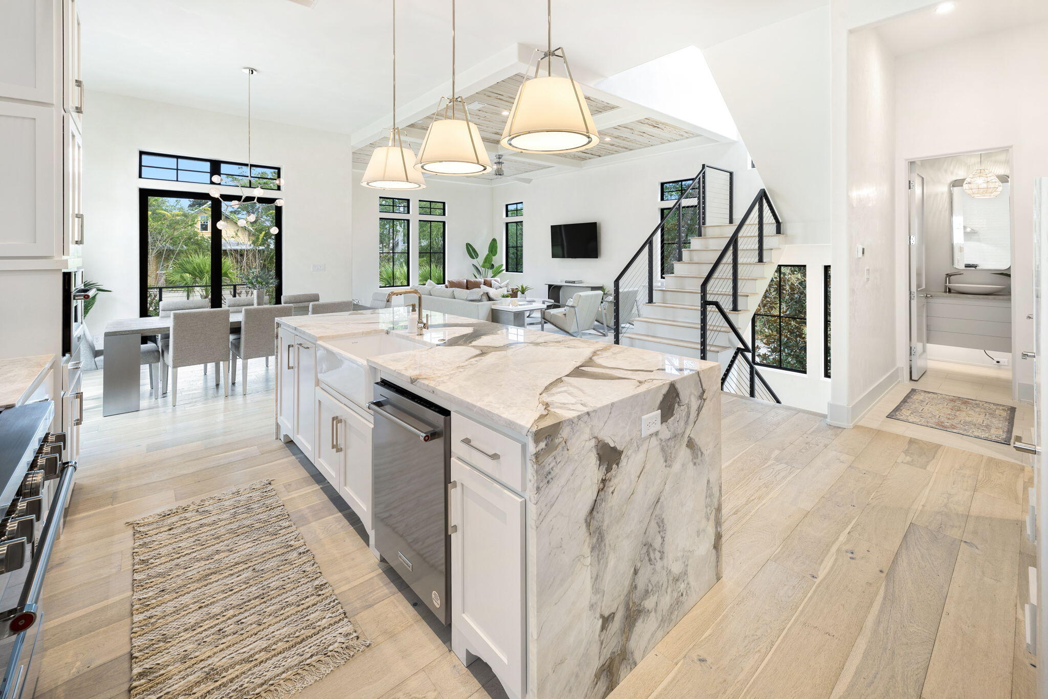 Step into this sun-soaked, 2023-built beauty in the heart of Inlet Beach! Sparingly used and fully furnished, this like-new residence is priced to sell and bathed in natural light thanks to its oversized windows and open, airy design.

From the moment you enter, you'll be captivated by the impeccable details, including striking Pecky Cypress ceilings, elegant Venetian plaster walls, and stunning quartzite countertops that grace every surface. The kitchen is a chef's dream, featuring a sleek waterfall countertop and plenty of space for culinary adventures. The second living area provides a versatile space perfect for hosting friends, family gatherings, or relaxing after a day at the beach. With accommodations for up to 14 guests, this home is a stellar choice for a private coastal retreat or potential vacation rental. A large 2-car garage with an additional spacious storage room ensures plenty of room for vehicles, beach gear, or extra storage needs, making this home as functional as it is beautiful.

Step outside to your own backyard paradise, where a private heated pool awaits. Surrounded by lush landscaping and privacy walls, the outdoor space invites relaxation year-round, whether you're cooling off on a summer day or enjoying the pool's warmth during cooler months.

This home is a MUST SEE, blending 30A coastal charm with high-end finishes in desirable Inlet Beach and rental projections of $155K-$165K. With its ideal location, thoughtful design, and stunning outdoor oasis, this property offers an exceptional living experience just moments from the Gulf's sandy shores but without the large price tag. Schedule your showing (in-person or Facetime) today!