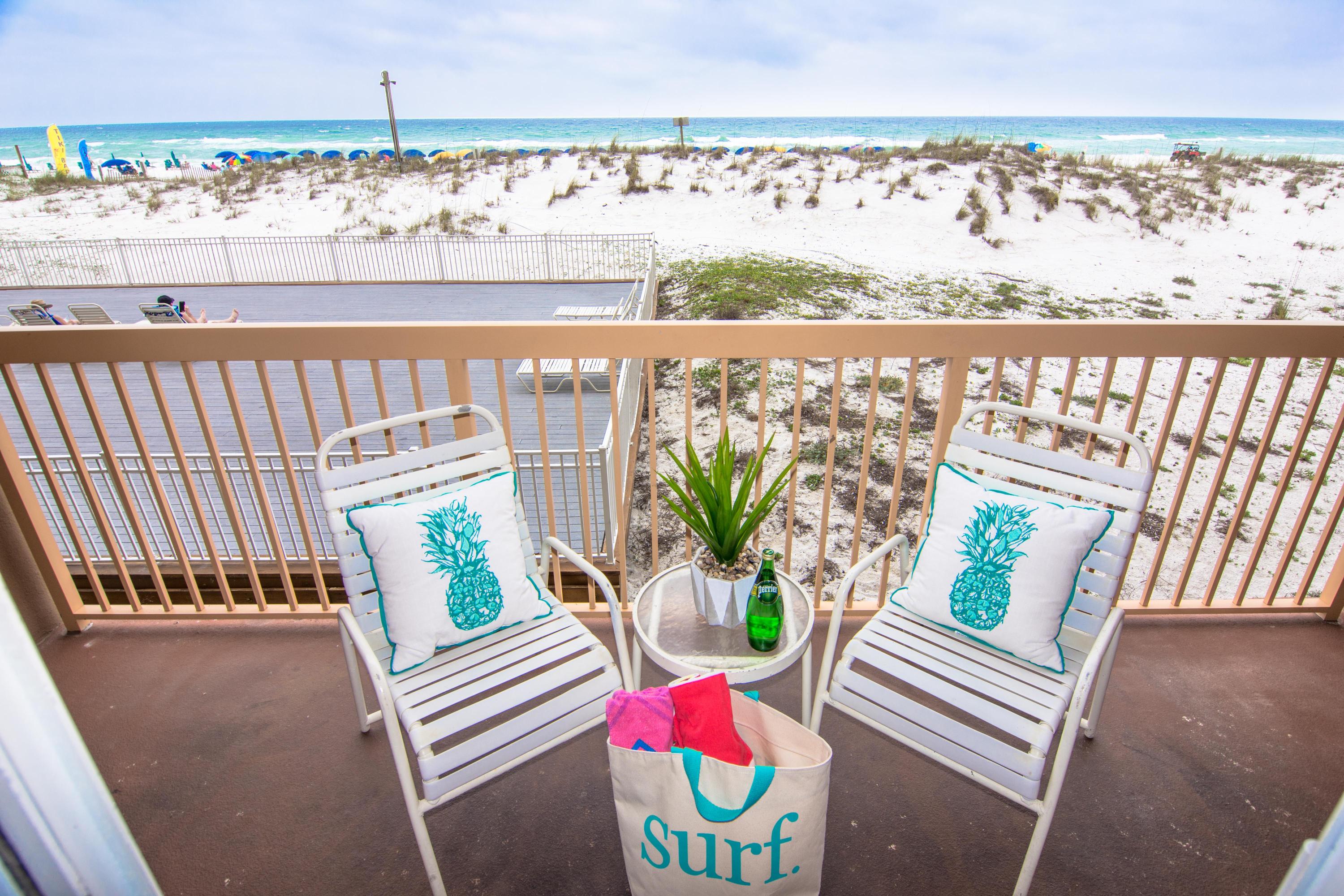 Rental powerhouse in the popular Pelican Beach Resort with a toes-in-the-sand GULF FRONT location on the famed beaches of Destin. Revel in this spacious and fully furnished condo with panoramic views of the Gulf from your balcony and living room  with a great first floor location so no waiting on busy elevators - yet sited high above the ground! Decorated with the beach and sun in mind, this condo features: tile floors throughout the condo, renovated kitchen with granite counters and extended breakfast bar, a king sized Master Suite with its own private bathroom and custom built hallway bunks that feature bead board and individual lights plus full sized guest bathroom. Easily sleeps 6 with sofa sleeper! Centrally located to all the dining and entertainment Destin is famous for including spas, shopping, golf, fishing and more. Pelican Beach has amazing resort style amenities, including: three swimming pools (one indoor), tennis, huge sun deck, beachfront grill, state-of-the-art fitness center, on-site cafe and sundry shop, 24 hour reservation desk, convention/meeting services and covered parking garage.