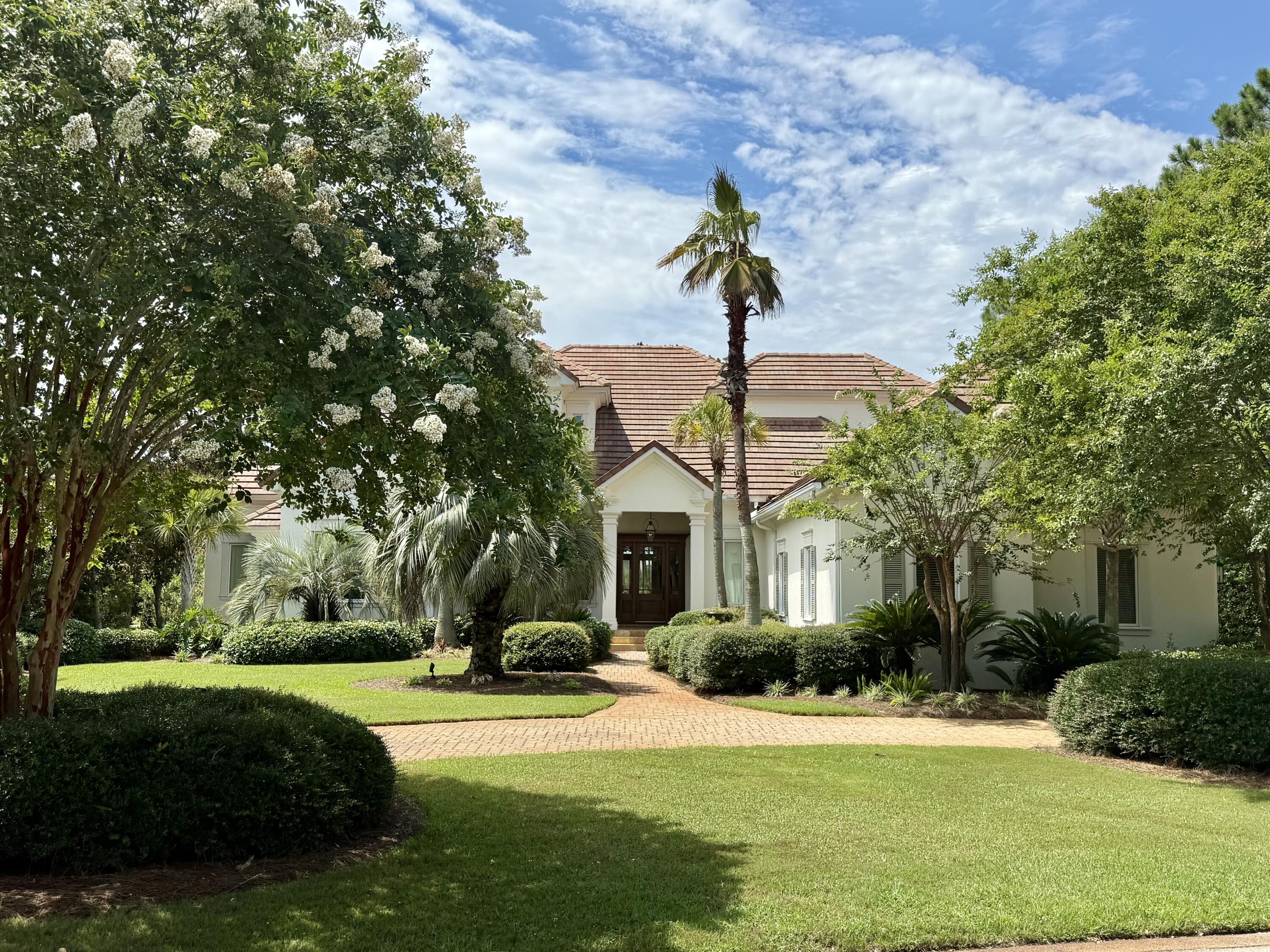 Don't miss a wonderful opportunity to own this custom 4,626 square foot residence located on one of the most desired streets in the prestigious, gated community of Burnt Pine, situated within the exclusive Sandestin Golf and Beach Resort. This exceptional 4 bedroom, 6 bath home exhibits timeless design and overlooks the 16th green - boasting expansive golf and water views and an incomparable, picturesque setting surrounded by mature trees and lush, manicured landscaping. The classic interior features 12 foot ceilings downstairs, 10 foot ceilings upstairs, custom cabinetry, extensive moulding, woodwork, natural stone and hardwood flooring, and luxury finishes to complement varied decor. 

The first level offers a spacious & flexible floor plan with living areas open to the kitchen and dining spaces to keep gatherings connected. The gourmet kitchen is a chef's and entertainer's dream featuring an oversized quartz island with hidden storage, professional-grade stainless appliances, including 3 ovens, a warming drawer, custom cabinetry with pull-outs & generous storage, plus built-in wine & bar areas. 

Living spaces are drenched with natural light from abundant windows and French doors that showcase a stunning vista that never gets old. Three sets of French doors open to a lovely back porch with remote retractable screens, an outdoor kitchen, gas fireplace, and enough room for dining and relaxation. Open the automatic screens and step out to your private tropical paradise featuring a unique pool design with programmable heater, light, and water features, twin fire bowls, sun shelf & loungers, and hot tub where you will enjoy the nearby bay breezes, night sky and Baytowne Wharf fireworks from the perfect distance.  

The first floor includes a sprawling master suite complimented by a sitting area with French doors that open to the back porch. Large, his & her walk-in closets include built-in wardrobe storage. Spacious bath features an expansive walk-in shower, garden tub, palatial mirrors, quartz, and mother-of-pearl finishes.

Also on the first level is an office suite with custom built-in desk and cabinetry and a half bath, as well as laundry room with built-in cabinetry & counters, and a second half-bath. Additionally, storage closets, a walk-in pantry, and central vacuum system make for a user-friendly and well-maintained home.

An impressive stairwell leads to the second floor which contains 3 bedrooms, each with en suite baths that include a walk-in shower. Two of the bedroom suites have French doors that open to an upper porch overlooking the delightful pool area and panoramic view. All bedroom suites include ample closets with built-in storage.

The large, 3-bay garage accommodates 2 vehicles, plus 1-2 golf carts, water toys, bikes, and more. Garage features epoxied floors, work areas with built-in cabinetry & utility sink, an additional storage closet, and an upstairs attic space which can be used for extra storage or a potential finished bonus area if desired.

As a private, gated community, Burnt Pine residents appreciate the added benefits of security and seclusion within Sandestin resort. Additionally, Burnt Pine spotlights a breathtaking, private golf course with a coveted, newly renovated clubhouse with amenities.

Sandestin Golf and Beach Resort offers an exciting lifestyle experience in a truly remarkable outdoor setting situated between beautiful Choctawhatchee Bay and the flawless white sand beaches of the Emerald Coast. This one-of-a-kind resort features 2,400 acres offering: 4 championship golf courses; world-class tennis courts; pickleball courts; a state-of-the-art fitness center and spa; renowned beach with watersports; pools; annual club membership options including the chic, newly updated Beach Club, Burnt Pine Club, Golf Club, Tennis Club, and Fitness Club; a full-service, 223-slip marina;  nature & biking trails; stocked lakes for fishing; sidewalks & golf cart paths; and an array of restaurants, boutiques, galleries, entertainment venues with scheduled weekly events, nightlife options, and more. For more detailed information on Sandestin Golf and Beach Resort, visit their website at www.sandestin.com.