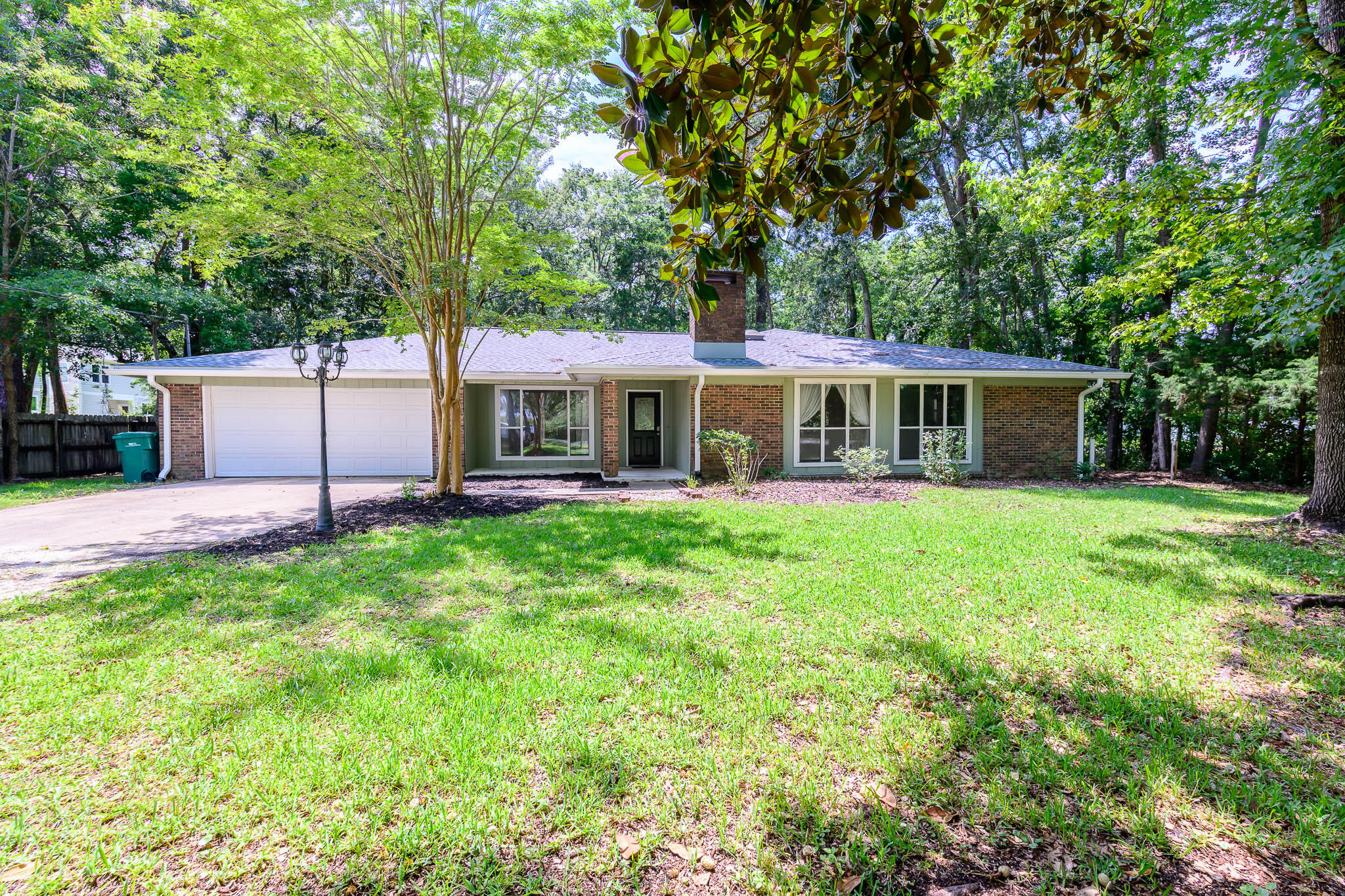 NEW paint throughout the house. Updated kitchen cabinets, and carpet removed and replaced with new LVP. Welcome to your new home, sweet home! This charming home is a true gem, offering the perfect blend of comfort and style. This ranch-style brick home is now available for rent with immediate occupancy.
As you approach, you'll immediately notice the inviting covered back porch, a wonderful spot to unwind and enjoy the great outdoors. With its classic brick exterior, this home exudes timeless appeal and offers a sense of warmth and character.
Step inside, and you'll find a spacious interior adorned with a combination of brick walls and traditional painted walls, adding a touch of rustic charm to your living space.  The open-concept layout creates a seamless flow from room to room, making it an ideal setting for both relaxation and entertainment. The heart of this home is the cozy corner brick fireplace, a focal point that creates a warm and inviting atmosphere in the living area. 
The kitchen features a convenient breakfast bar. It's the perfect place to enjoy your morning coffee or whip up delicious meals. With ample counter space and storage, this kitchen is both practical and beautiful.
This home boasts four bedrooms, providing ample space for your family or guests. The master suite is a peaceful retreat with an ensuite bathroom, ensuring total comfort. In total, there are two full baths and one-half bath.
Don't miss out on the opportunity to make this delightful home yours.