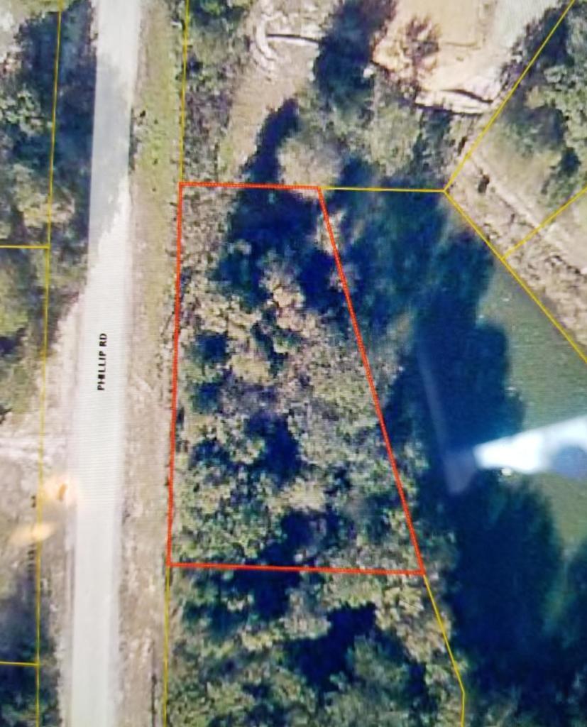 Lot 15 is adjacent to another vacant lot along the shoreline of private pond. Minimum of 1400 Sq. Ft. Build your custom home. Setback of 20 Ft. in front and 10 ft. sides and rear.