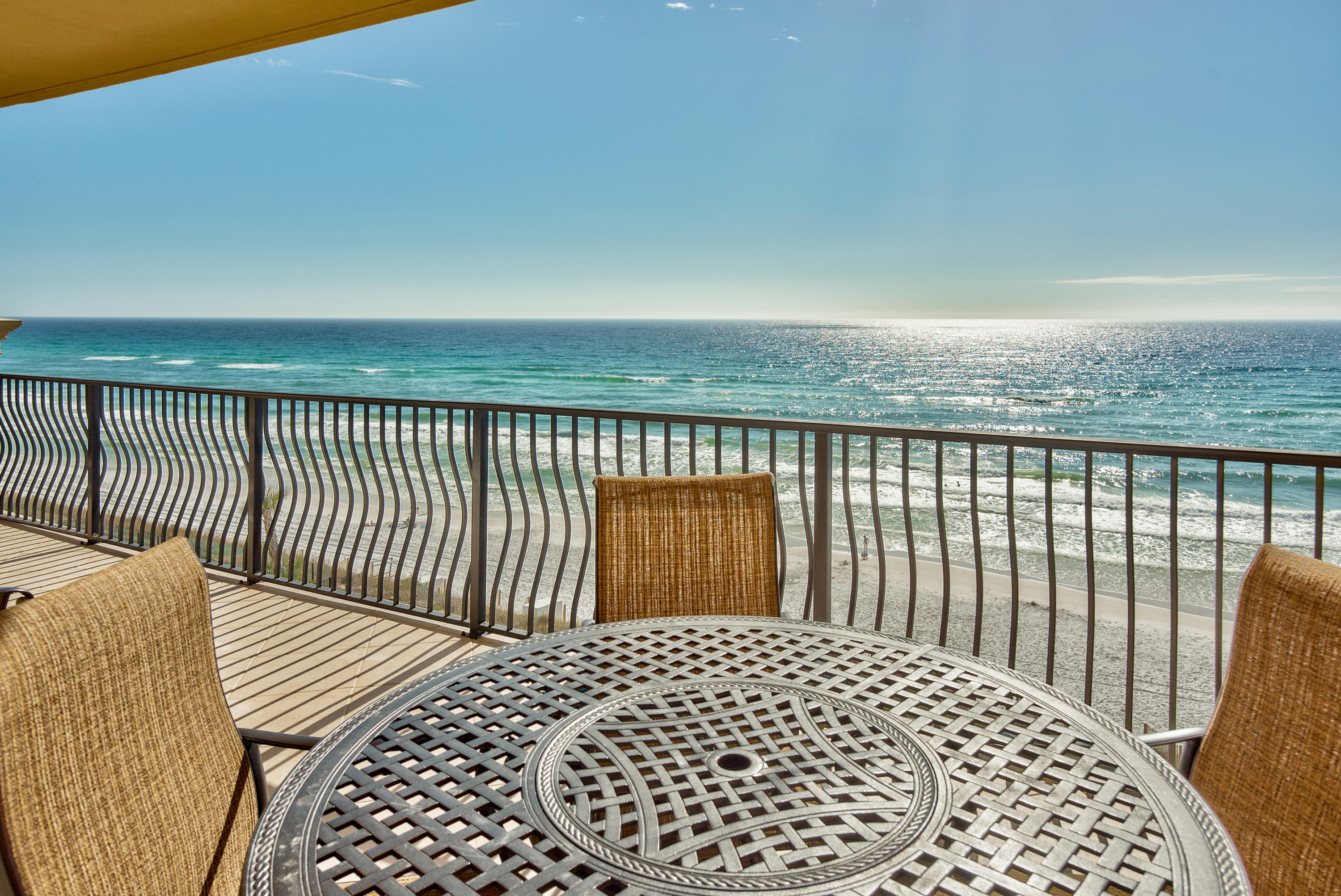 Seize this unique opportunity to move into a top floor corner condo in the coveted C-building at Adagio in Blue Mountain Beach. Beyond the dunes, panoramic views take in the glittering white sand and emerald gulf waters. Enjoy morning coffee or breakfast out on the deep balcony watching pelicans glide over the gently turning waves. It's like sailing gently along on your own private yacht or cruise ship. Understandably, this beautifully appointed four bedroom unit has generated outstanding rental income for past owners. Relax in the well-proportioned living room and appreciate the gas log fire as a focal feature while admiring the unsurpassed sea views. The condo is tastefully decorated with a palette of muted tones complemented by crown molding. Marble tile flooring laid on the diagonal provides a seamless continuity between the sitting area, formal dining area and the open-plan kitchen. A half-wall breakfast bar with granite countertop provides a place to hang out with the cook or share casual snacks and meals. The spacious kitchen is fully equipped with wood cabinetry and built-in stainless steel appliances. The generous bedrooms are served by three bathrooms, two ensuite including a whirlpool tub in the opulent marble master bath. Adagio amenities are just as impressive as this delightful condo. There's a gulf-front pool and sun terrace, a tri-level pool providing 8,000 square feet of refreshing fun for youngsters, a state-of-the-art fitness room, hot tub and gas grills. Located south of Scenic Highway 30A in Blue Mountain Beach the gated community is within easy reach of Point Washington State Park and Topsail Hill Preserve. Outdoor adventurers can enjoy the endless trails for hiking, biking and nature spotting.
