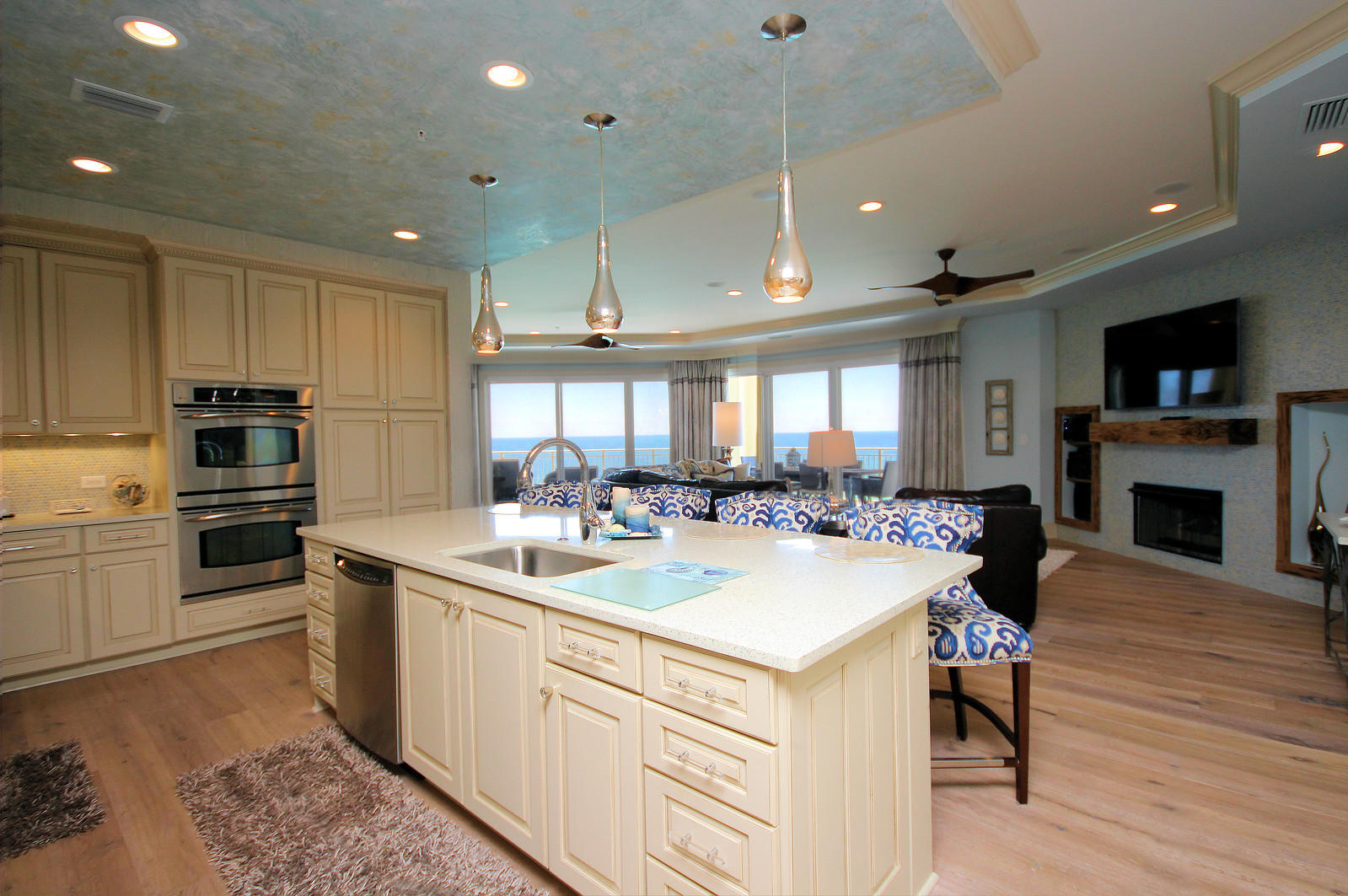 This stunning unit in Grand Dunes Resort is located in the grandest of all floorplans, the ''10'' stack of the South Tower. Providing a full 180 degree breathtaking view of the Gulf of Mexico. This gorgeous Lovelace Interiors designed unit is being sold furnished (excluding only a couple of pieces.) With 3,150 sq. ft. of interior living space, and 460 sq. ft. of covered, wrap around, tile clad outdoor living space. Adorned with a built-in stainless steel natural gas grill protected by hurricane shutters. Beautiful 9'' wide oak plank flooring, sea glass & shell countertops, custom cabinetry with soft close drawers, custom artwork, gas fireplace with custom pecky cypress mantle, surround sound with ceiling flush mount speakers, wet bar with matching countertop and cabinets, separate media room, custom window treatments, wall mount TV's, can lighting throughout, seamless glass showers in guest baths, master bath has jetted tub with travertine surround, separate shower w/ dual heads, the list just goes on and on! Grand Dunes Resort is a rental-restricted property, and offers a "Super Quiet'' interior pre-wired for the latest security and audio/visual entertainment, 24 hour security, gated entrance, gated underground parking for owners, Owner's Lounge and Fitness Room, 2 overflow suites for your guests, Private heated pool, Lagoon style gulf-front pool and hot tub area, high speed semi-private elevator that exits to your private foyer, 200' of private deeded beach, beach service and some of the most gorgeous views of the gulf and sugar white sands of the Beaches of South Walton! Grand Dunes is the "Emerald Coast's Premier Gulf Front Development"! Call to schedule your private viewing!