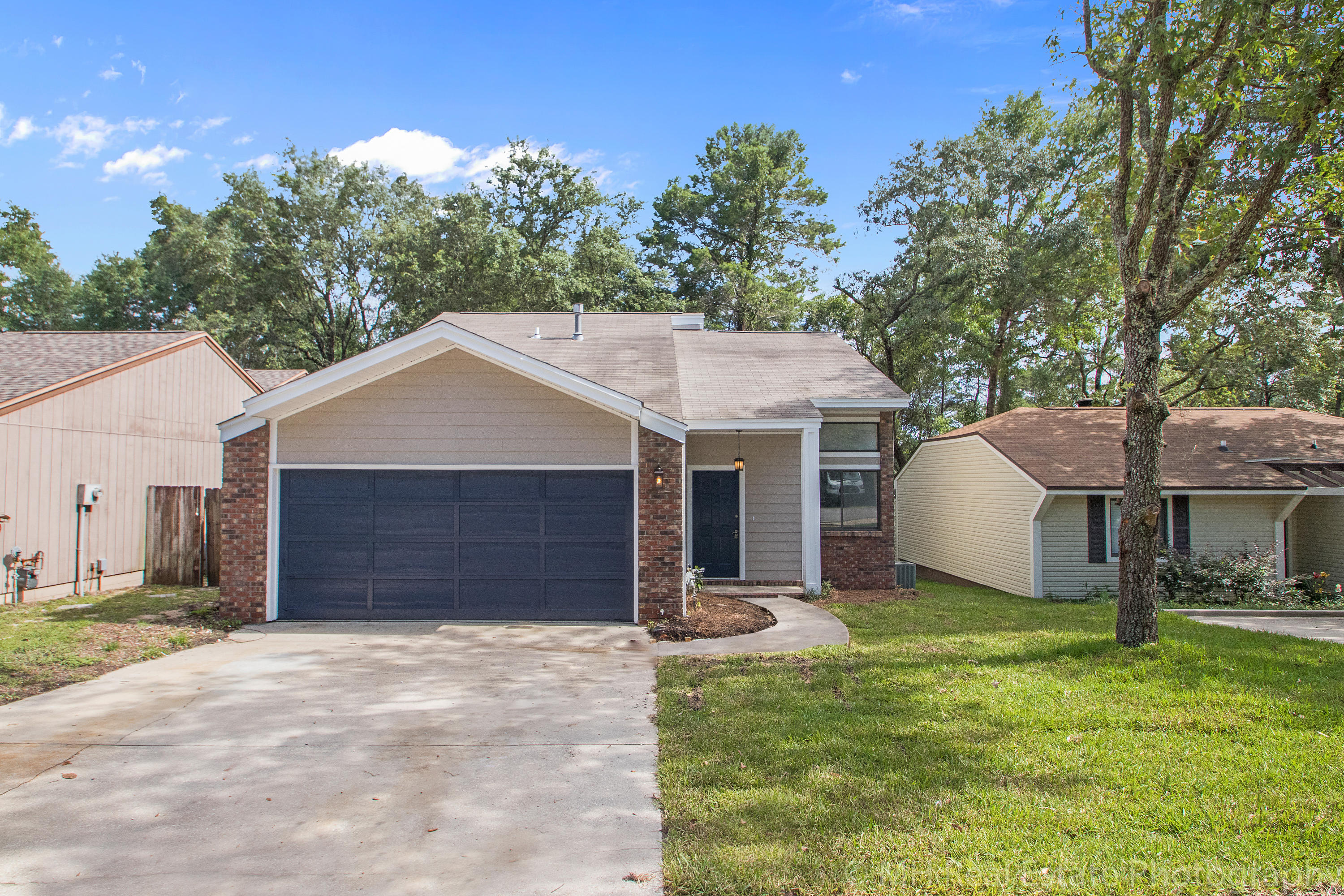 Wonderfully updated home centrally located in Cedar Ridge in Niceville. This home has undergone a complete renovation including new hardi plank siding on the exterior. Inside, the kitchen and both bathrooms have been updated. Brand new white shaker cabinets and viscount white GRANITE counters with upgraded STAINLESS STEEL appliances. Downstairs bathroom has a custom stand up tile shower and designer vanity. New Santa Fe style interior doors and tall baseboards. All new lighting throughout. Out back is a large deck overlooking a newly landscaped yard and fenced yard backing up to a green space. Come see this home today.