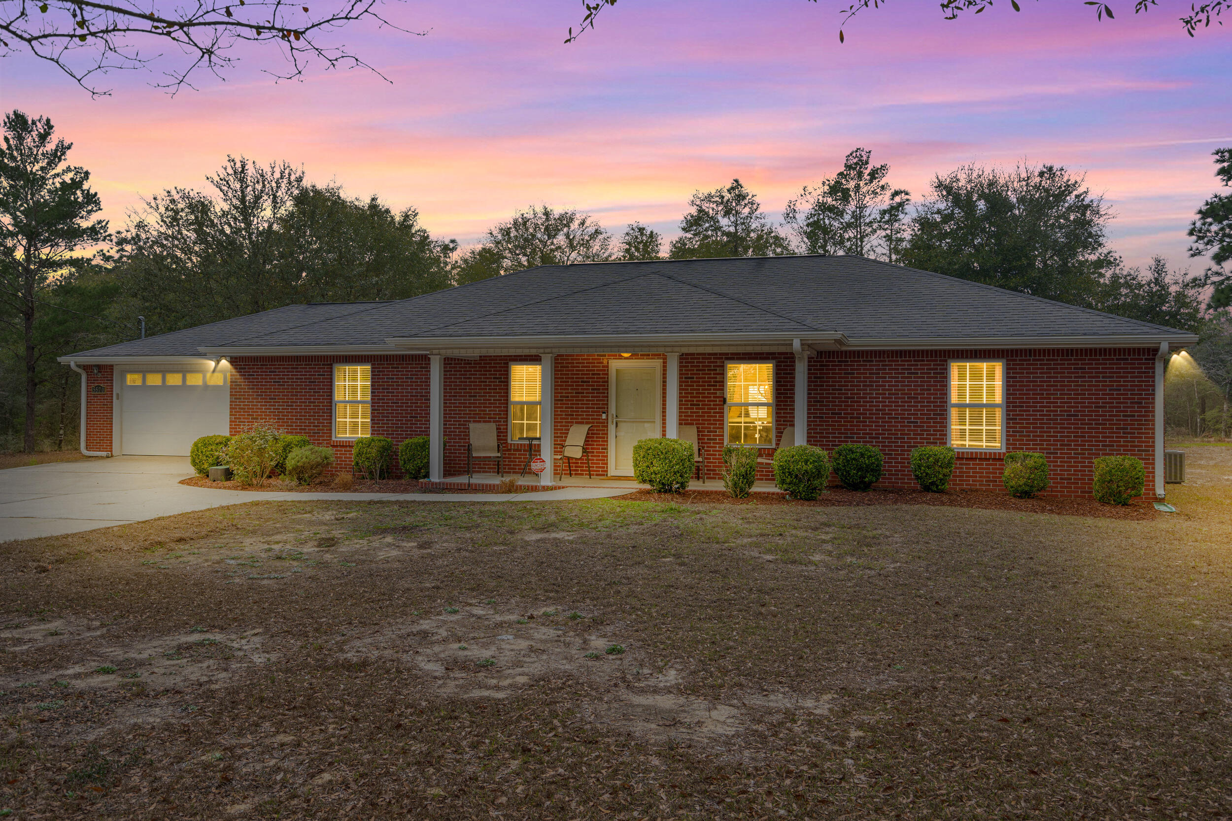 Motivated Seller!! Don't miss this incredible opportunity! This beautiful 5-acre property offers a charming brick home with new appliances, LVP flooring throughout, and a modern alarm system--move-in ready and packed with updates. Outside, the possibilities soar with a 20x40 enclosed and insulated pole barn set on a 44x60 concrete pad, giving you tons of extra parking, workspace, or storage. The pole barn also features a plumbed bathroom, ready to connect to the second septic system--already installed and rated for a 3-bath home. Build a guest house, pool house, or second residence--the groundwork is done! With 2 acres already cleared, you have room to expand, create your dream outdoor space, or simply enjoy wide-open country living. 2 miles from the new Shoal River Industrial Park.