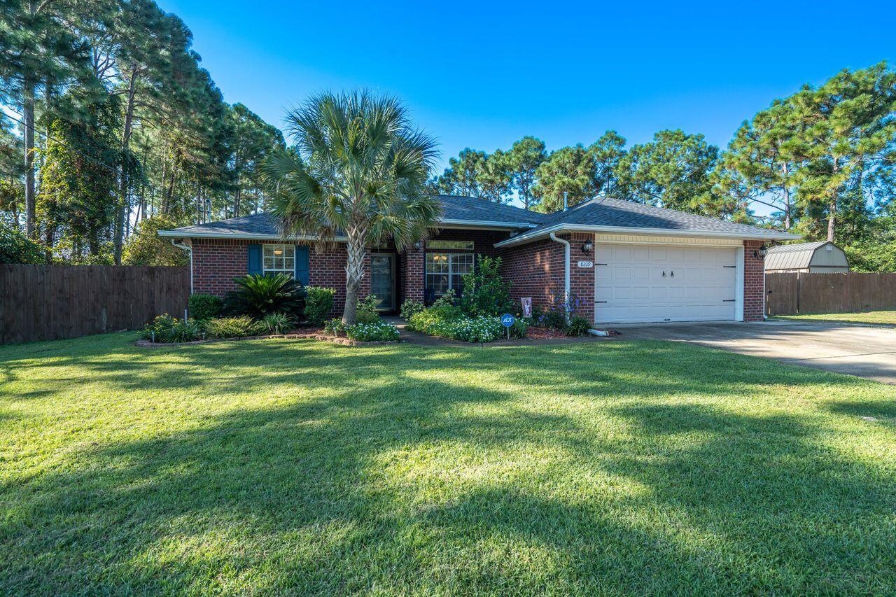Beautiful 3 bedroom/ 2 bathroom all brick home on over a half-acre lot located in the heart of Navarre. As you walk through the front door, you will immediately notice the open concept floor plan. The living room and the kitchen have updated light fixtures. Kitchen has some stainless steel appliances, kitchen island, stained kitchen cabinets, breakfast bar and a pantry. This home is a split floor plan with high ceilings, LVP flooring throughout the home. Master bathroom has walk in closets for him and her, tile flooring, double vanities, shower and a large garden tub. Roof was recently replaced in January 2018 and a security system with 8 cameras for home monitoring. Enjoy the open back patio/deck with mature landscaping and a fenced in backyard.
Shed (16 X 10)