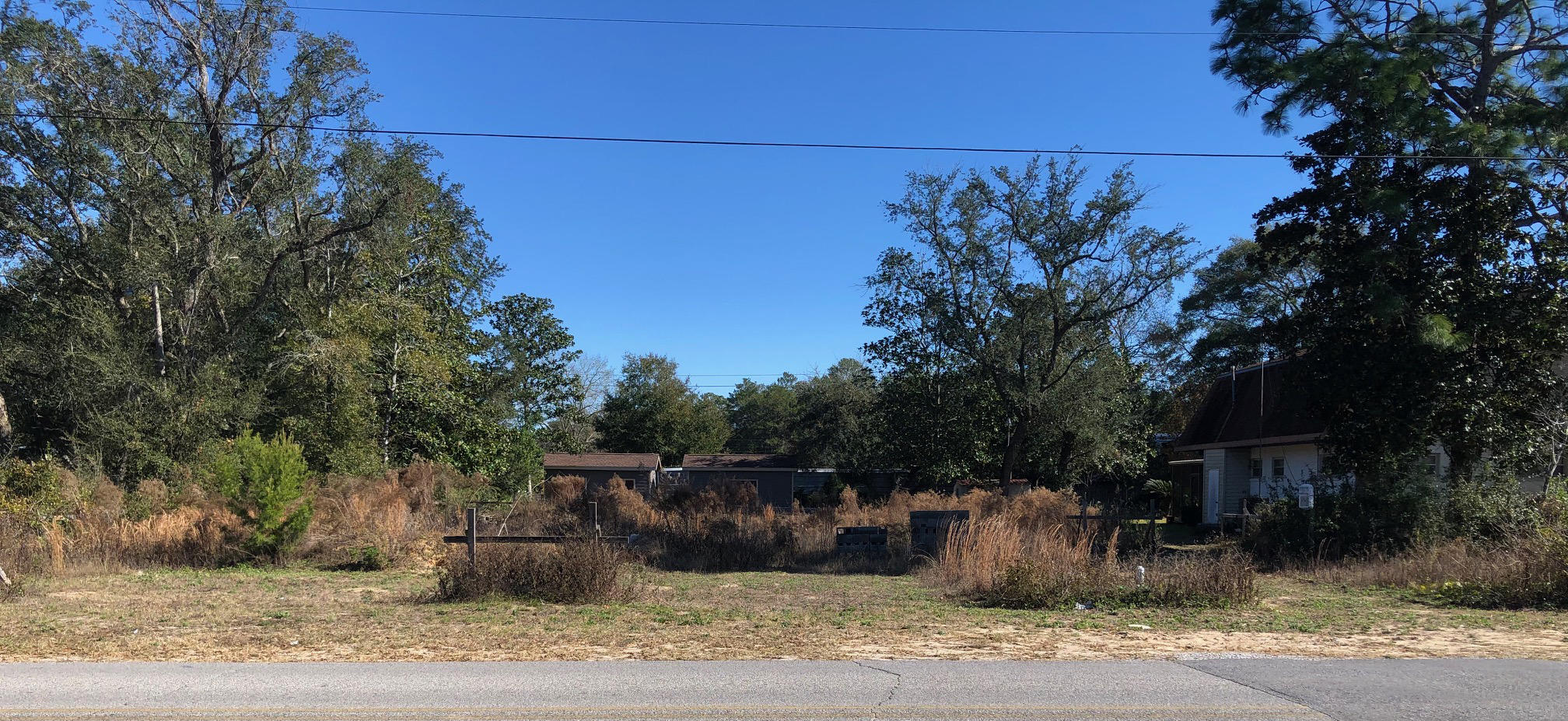 Rare property in great location ready to be developed.  Large ,44 acre property zoned Mixed Use cleared and Tap fee paid for Single Family Home.  House plans are available from Seller under separate agreement. Two storage sheds on rear of property will convey.  Other members of the Family own lots on either side of this lot so potential of 1.33 acres could be made available.  Buyer to verify all information deemed important.