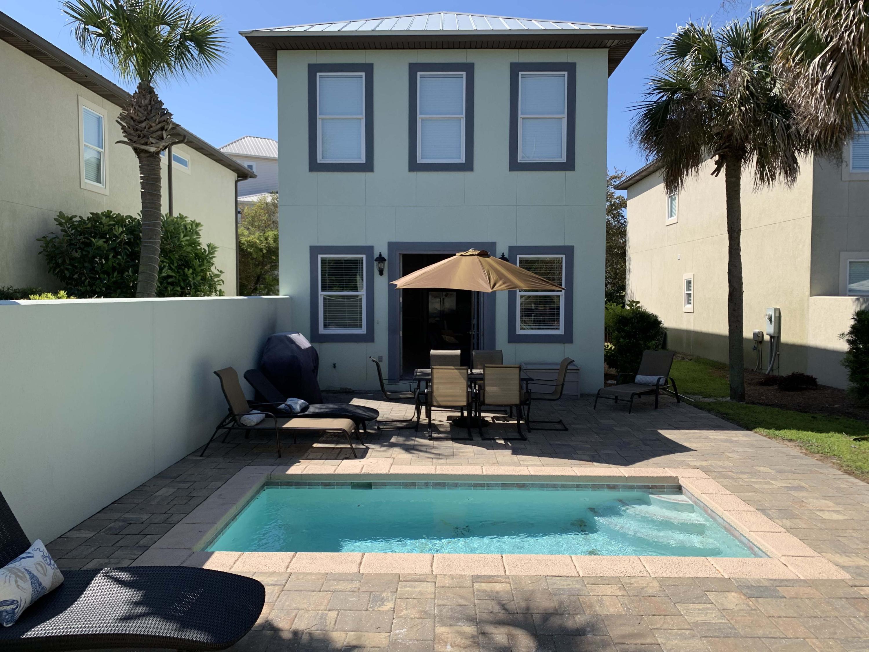 $60,000 PRICE DROP !! A 6 bedroom Beach house with a private pool for under a million dollars that is just one row from the beach is amazing! The only thing more amazing is that it is almost totally booked for the summer too! The lucky buyer of this house will be getting money from rentals as soon as they close. 2018 Gross Booking Revenue was $62,637 and $50,215 is on the books for 2019 already. Home is stucco and was just painted last year. Pool has a new heater and all furnishings are less that 3 years old. NO association fees and low taxes are a big plus too. Steps to the beach. Walking distance to the Outlet mall and lots of restaurants also make this a prime location for a rental. Make sure this is on your list to see and you will not be sorry you did.