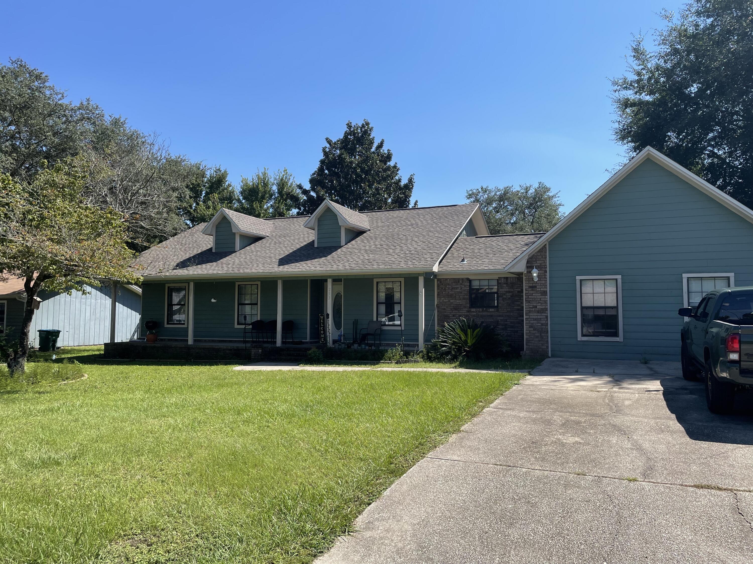 Available for move in Nov 1st. Conveniently located 3/2 home on the south end of Crestview with a huge bonus room! Complete with fireplace, stainless steel appliances, wood laminate in the living and dining areas and tile in all wet areas. Carpet is located in all bedrooms and bonus room. Large fenced in backyard. Solar panels to help with the power bill!