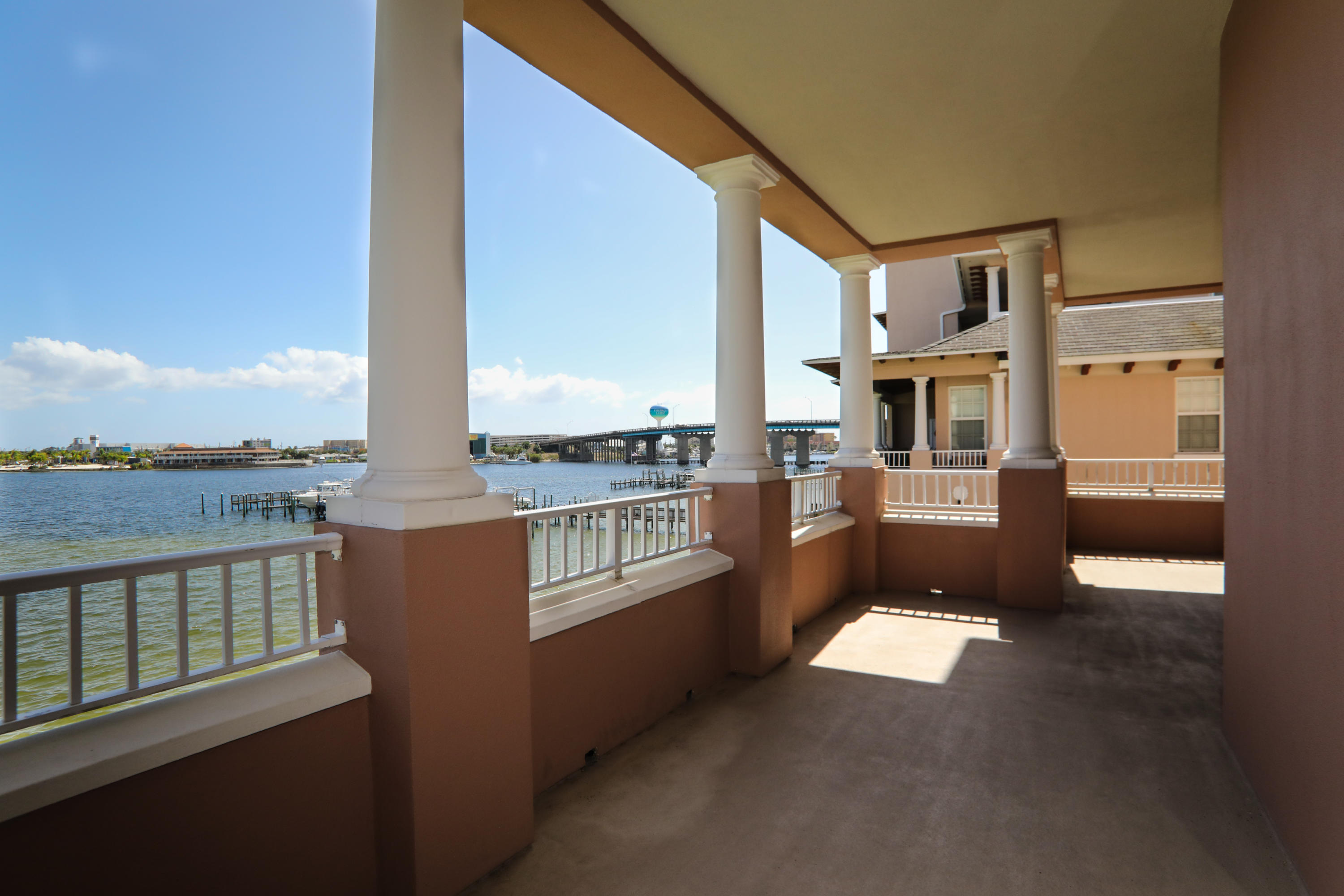 Awesome views from this 3rd floor balcony of Choctawhatchee Bay. Waterfront living without the maintenance. Exquisite Italian Villa design. Interior features include split bedroom design, crown molding, recess lighting, ceramic Italian style tiles throughout the living areas, carpet in bedrooms. 2 car attached garage with access directly into the building first floor and elevator area. Unit also has attached 8 X 12 storage unit accessible from garage. Open floor plan with living room, dining room and kitchen open with view of the bay. Master bedroom has balcony access, large walk-in close, separate shower, double vanities and whirlpool tub. Kitchen has upgraded cabinets with glazed maple. Even the refrigerator has the same matching cabinet finish. Built-in oven and microwave, dishwasher and cooktop along with granite counter tops makes this kitchen easy to get around.  Large walk-in pantry.
Enjoy the views from the balcony, including Fort Walton Beach and Destin fireworks.  This unit does not include a dock.  Seller is not aware of any docks that are available at this time. Owner is a licensed Broker/Salesperson.