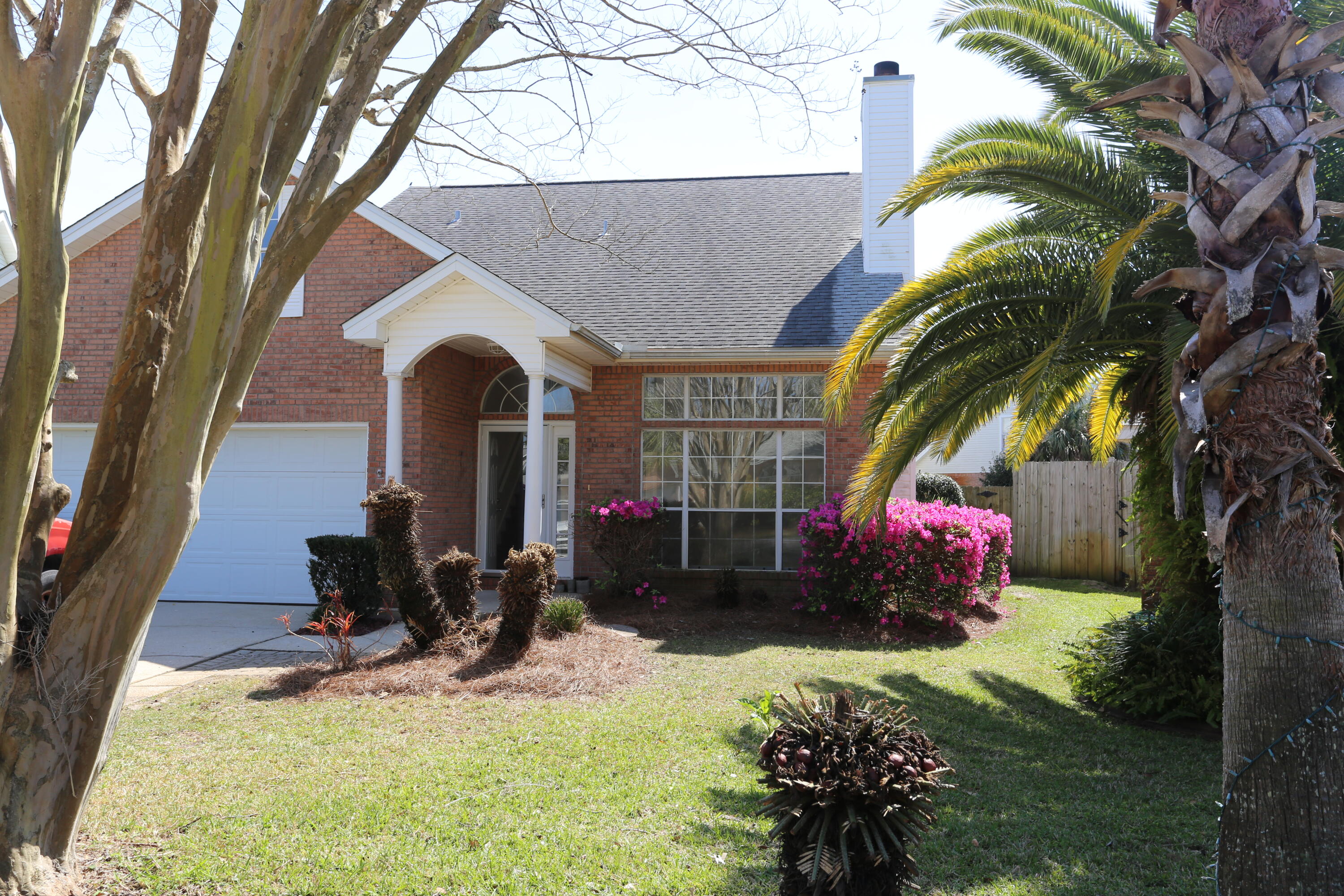Beautifully upgraded, light-filled turn-key home with new appliances. Spacious eat-in kitchen w/granite countertops & marble backsplash. Wood flooring downstairs and upstairs with tile in kitchen. Four large bedrooms make this the perfect family home!  Garage converts to screen room for added play & work space. Private yard with beautiful lap pool, high fence, patio pavers and room for entertaining. Custom pool w/gunite benches, waterfall, and hydrojets. Pool storage box/accessories included. All appliances and washer/dryer included as well as, second fridge outside in garage. Dimensions to be verified by buyer. Quiet neighborhood with convenient location to military bases, businesses, markets, restaurants and just minutes to the beach!
