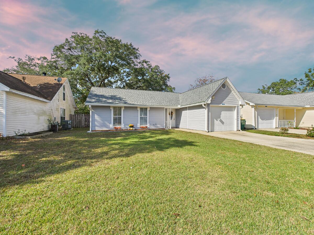 Welcome to 3018 Blue Pine Lane! This home offers a highly functional 3-bedroom, 1.5-bathroom layout with approximately 1,056 sq ft of living space, ideal for a starter home, investment property, or low-maintenance living. Enjoy attractive curb appeal with vinyl siding and a manicured lawn leading into a bright and inviting interior. The floor plan includes a spacious living room that flows seamlessly into the dining area, highlighted by a charming bay window perfect for everyday meals. A dedicated laundry room off the entry provides added utility space and shelving. All bedrooms are comfortably sized, and the home includes a clean full bathroom plus a convenient half bath. Since purchasing in 2019, the sellers have replaced all major systems and appliances, offering peace of mind & added value for the next owner.  Outside, the fenced backyard features a concrete patio, great for grilling, relaxing, or entertaining. Please note: the garage was modified to accommodate interior laundry, so it is no longer a full 1-car garage. Located just minutes from Eglin AFB, local schools, shopping, and the beautiful Emerald Coast beaches, this well-maintained home offers outstanding convenience in a desirable Niceville community. Blue Pine Village has a community pool and an additional storage area for Boat and RV parking. Don't miss this opportunity!