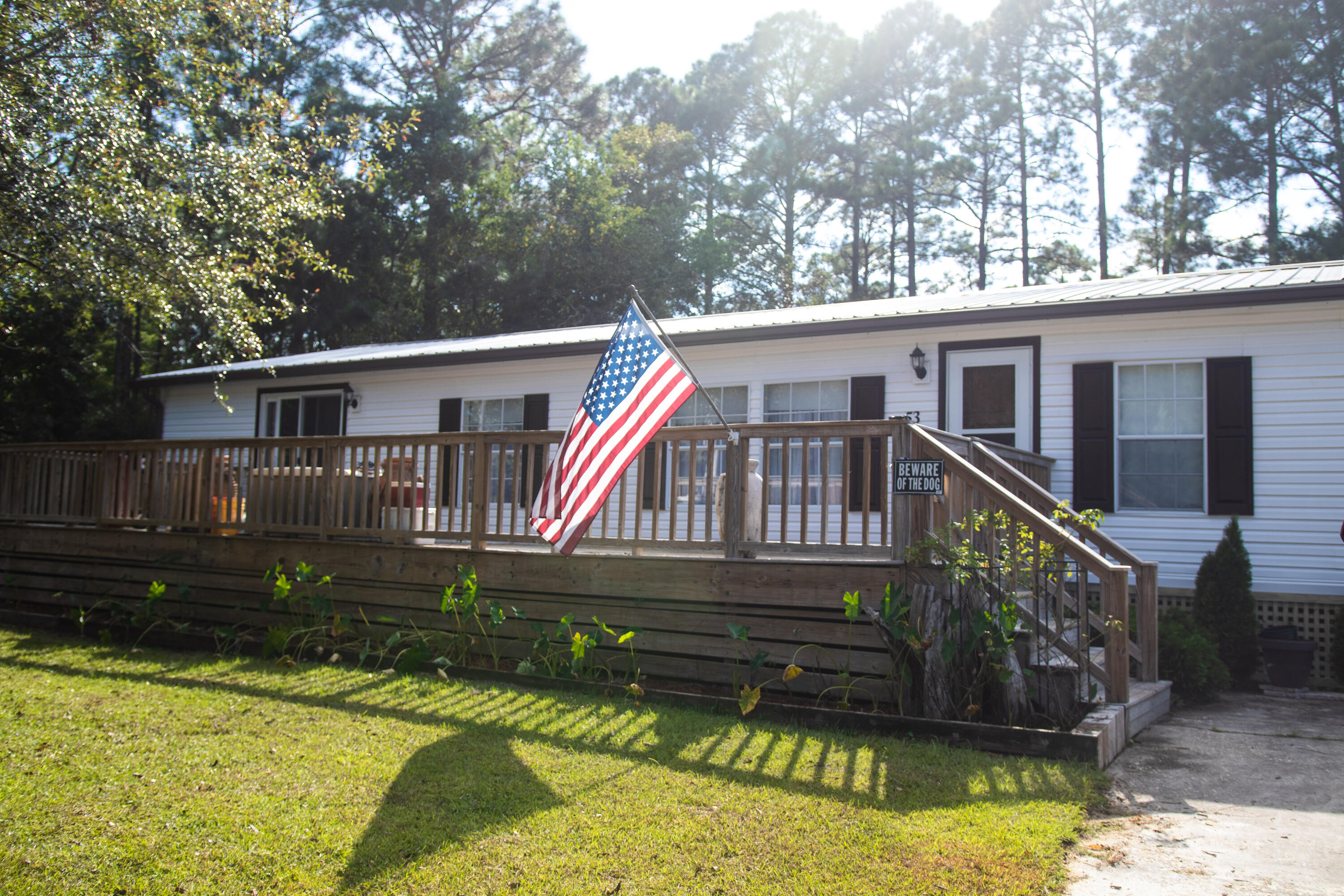 Take a look at this one of a kind home just a few steps from the Bay in Santa Rosa Beach!

53 21st St. has been completely redone, with exotic woods and materials throughout.

As you step inside this 1690sqft home, you're greeted with solid, hardwood teak floors. The ceiling of the master bedroom and cabinets are made of solid Deadhead Cypress.

The kitchen features stainless steel appliances, and reclaimed pine cabinets throughout. LVP lines the floor of the kitchen.

A large, fenced in backyard features a sealed in patio, 8ft privacy fence, and a workshop with plenty of storage.

Ductwork and plumbing has been updated last year.

Come take a look today!