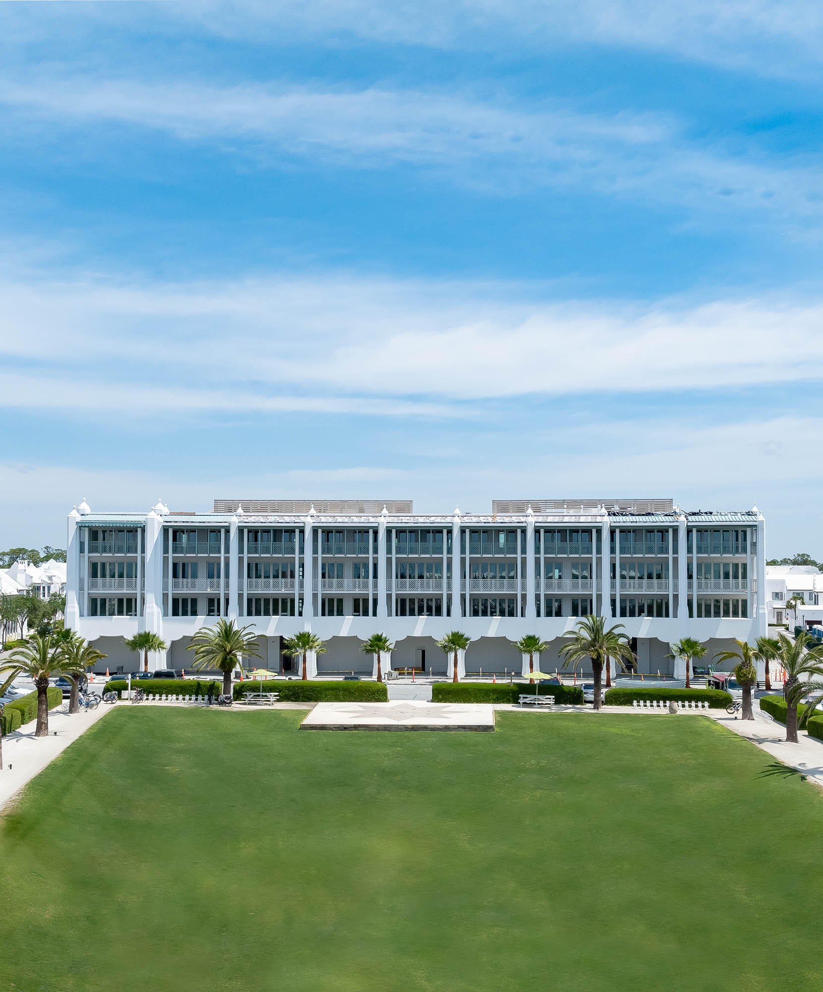 Introducing The Della Condominiums.  Below the sand, peat, and karst substratum of Alys Beach's unique geology, resides a deep architectural history that forms the foundation of its broad cultural heritage. While largely Bermudan and Antiguan in character, there are veins of architecture from even more dazzling beachside locales around the globe. The design of the Della draws from the romance of British and Venetian turn-of-the-century seaside resorts with their rippling tented cabanas, cool bubbling pools, shimmering mosaics, and beach balls aloft — each dusted with grains of sand. Encapsulated in the shell of The Della is a place of play, conviviality, and family. This, for me, is the essence of Alys Beach.