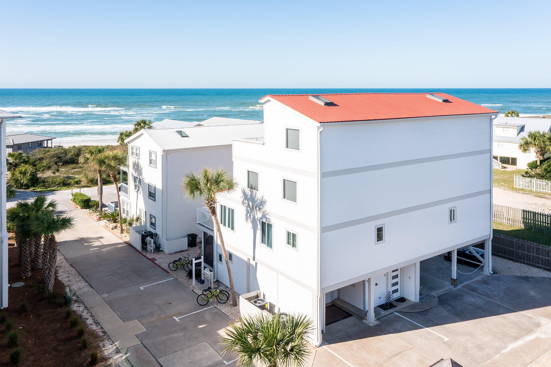 Welcome to 448 W Park Place Ave - Memories at Inlet Beach. Beautifully updated four-story coastal retreat steps from one of South Walton's most secluded beach accesses with unobstructed gulf views, clean restrooms, and a stunning boardwalk. Recent upgrades include a new metal roof (2023), mini-split (2024), water heater (2021), all-new kitchen appliances (2021), white plantation shutters (2024), stacked washer/dryer (2025), and a Peaden air purification system (2023). Luxury vinyl plank flooring throughout; quartz in primary bath. Designed for up to 12 guests with two full living areas and kitchens. First Floor - The Grandparents or Teen Suite offers two queen beds, a new couch (excluded), a full bath, and a kitchenette with refrigerator, stove, and sink. This private guest level also includes an outdoor shower, grill, and generous owner storage.
Second Floor - The main living/dining area features gulf glimpses, a sundeck, an updated kitchen, and a powder room with new W/D.
Third Floor - The Primary Suite offers gulf views, a workspace, and an ensuite bath.
Top Floor - The Family Suite includes twin beds, a bunk area, a kitchenette, an ensuite bath, and a rooftop balcony with panoramic views.
Walk or bike to Rosemary Beach, 30Avenue, dining, shopping, and Camp Helen State Park. A rare blend of location, updates, and flexibility in one of 30A's most coveted pockets.