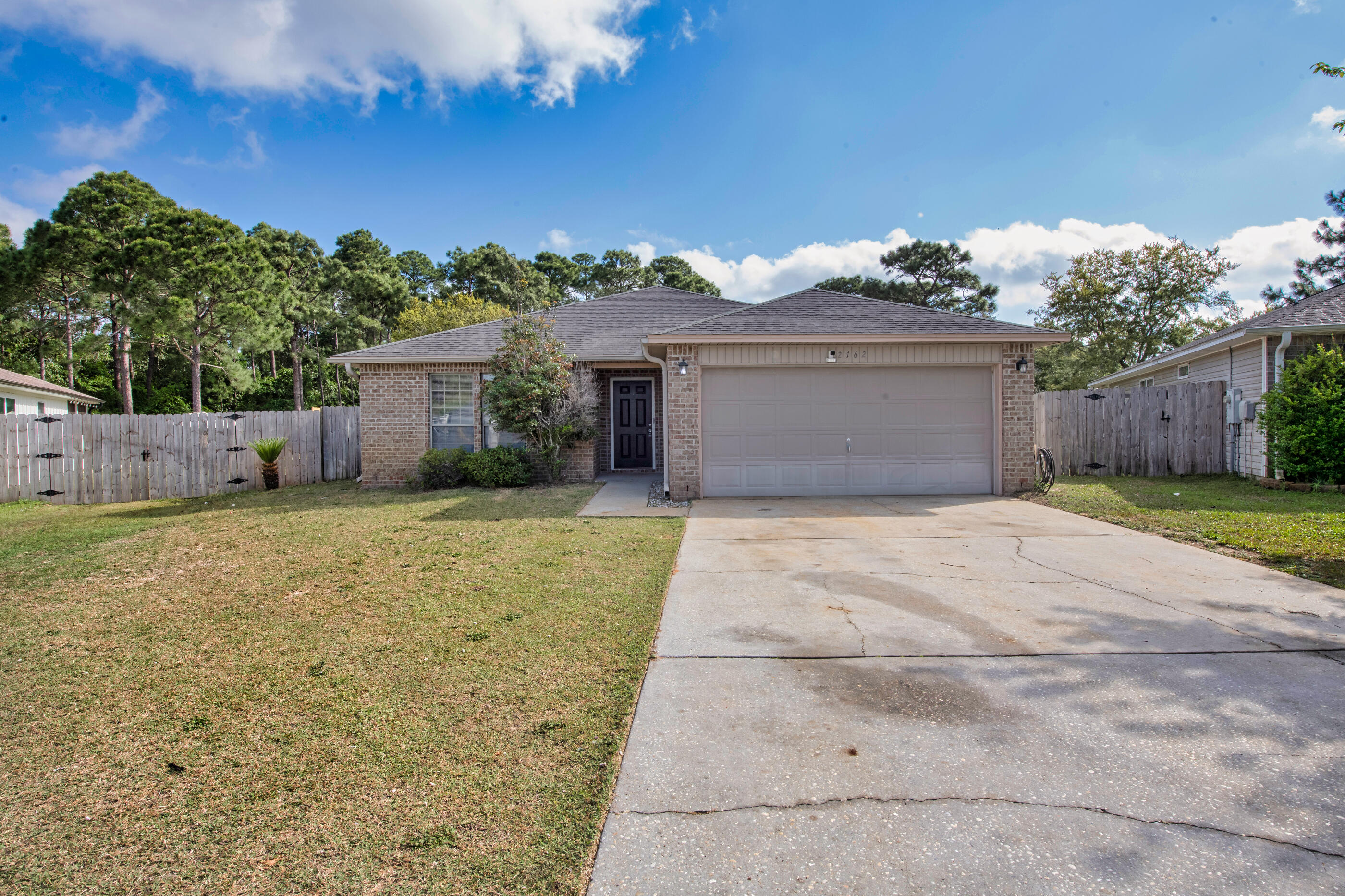 PRICE REDUCED! Dream Layout, Massive Lot, Minutes to Navarre Beach!
Looking for space, comfort, and beachside convenience? This Promise Creek stunner has it all! Nestled in a peaceful cul-de-sac, this 3-bedroom, 2-bath beauty sits on an impressive .45-acre lot and is just 2 miles from breathtaking Navarre Beach.
The thoughtfully designed split floor plan offers functionality and flow, with a large family room, spacious dining area, and a well-appointed kitchen featuring upgraded stainless steel appliances, gorgeous raised-panel wood cabinetry, and a stylish three-sided breakfast bar for casual dining. Just off the kitchen, a door leads to the laundry room and attached two-car garage, complete with attic stairs and garage door opener. Out back, enjoy your mornings or evenings on the screened 8'x10' covered porch, with direct access to your huge, private backyardperfect for pets, play, or even a future pool! Retreat to your expansive primary suite, where double doors lead to a spa-like bathroom with a garden tub, separate walk-in shower, water closet, and an amazing 12-foot walk-in closet that's sure to impress.
With schools and shopping just a short walk away and a builder warranty still in effect since its 2009 construction, this home won't be on the market for long. Call today and schedule your showing before it's gone!