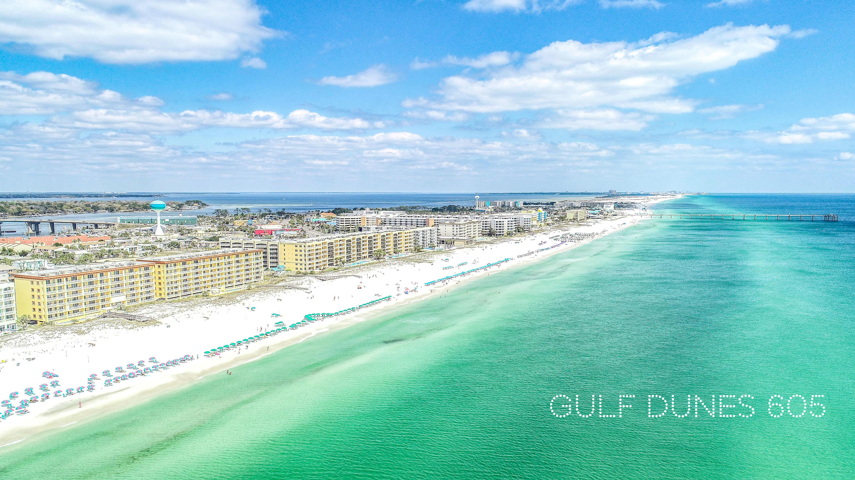 In Gulf Dunes, home to the ultimate luxury coastal lifestyle - you'll find this fabulous 1 bedroom + bunks, 1.5 bath condominium! This prime top floor condo conveys fully furnished and rental equipped already on a rental program. This condo has amazing views from its top floor, 7th story elevation. Spacious and well equipped, this condo offers a spacious master suite with king bed, hallway bunks, living room with sofa sleeper, and a balcony with bar height furniture for the best views!  Gulf Dunes is finishing a large exterior project this month and the entire building is freshly painted in a bright new coastal color scheme plus new lighting!  Gulf Dunes Resort boasts 425' of Gulf front, 2 swimming pools (1 seasonally heated), tennis courts, bbq area and exercise room. Okaloosa Island is much less crowded than Destin but still great entertainment, summer fireworks and restaurants but still great entertainment, summer fireworks and restaurants including popular "The Gulf" and "AJ's Oyster Shanty". All you need to bring is your bathing suit! Buy now and capture the high dollar spring break and summer rental income! For more interior photos, please visit https://www.emeraldcoastrentals.com/vacation-rentals/rental/1207-26193/