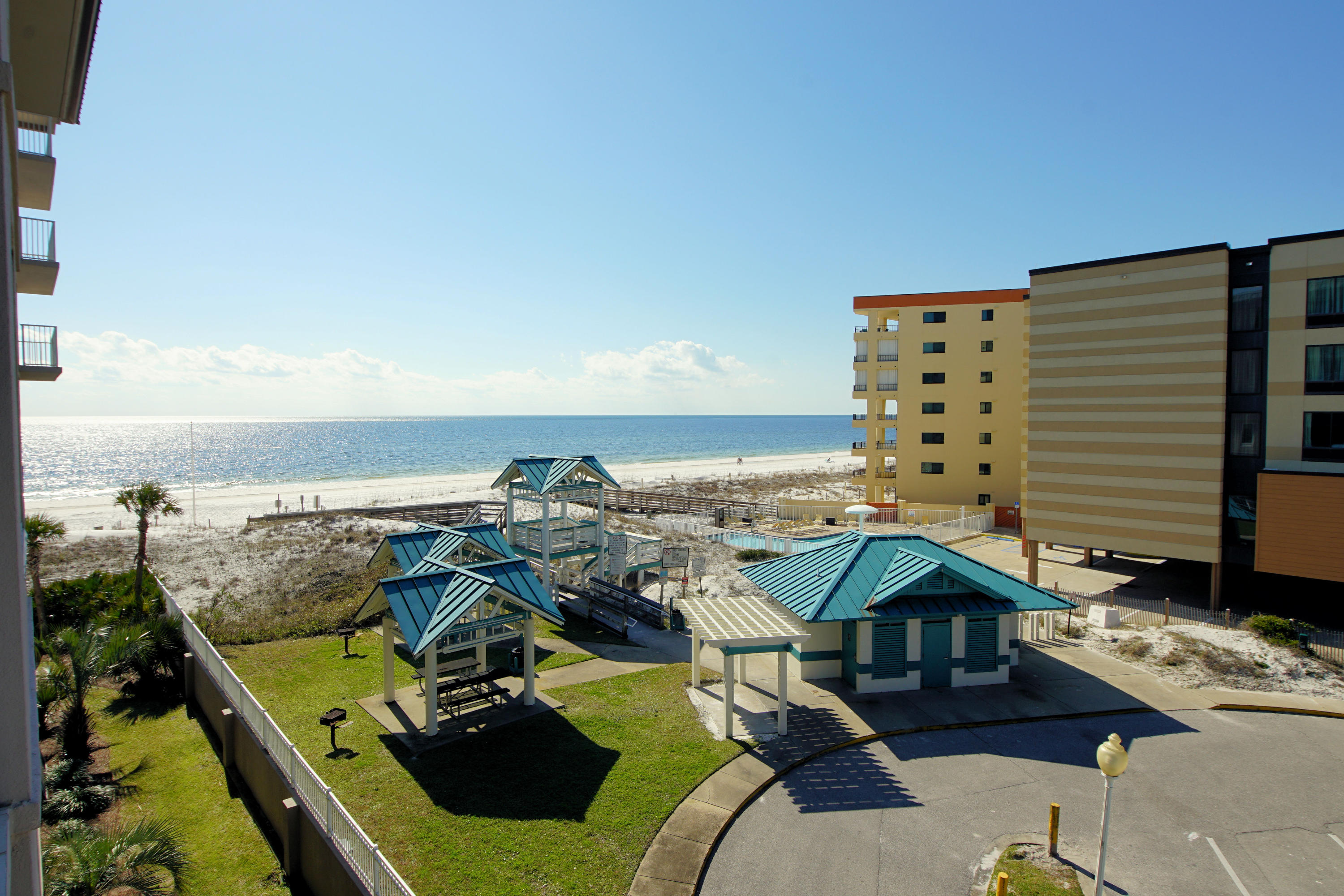 Natural Beach Colors within and Gulf views from balcony, living and master bedroom of unit 418 Island Princess. Renovated from floor-ceiling; contemporary 48'' wood plank porcelain floor tile, new trim, lighting fixtures, and smooth ceilings throughout. Gorgeous kitchen; white cabinets, Stainless Steel appliances and back splash with colors of Gulf. Bathrooms showcase beautifully tiled showers, new sinks and vanities. Fully furnished and rental ready, the decor captures the essence of the Emerald Green water and White Sandy Beaches of the Gulf of Mexico. Covered parking space 418 conveys. Island Princess has a reputation for it's well managed association; amenities include seasonally heated pools,hot tub, gym, gas/charcoal grill gazebos, Beach service for chairs/umbrella and internet.