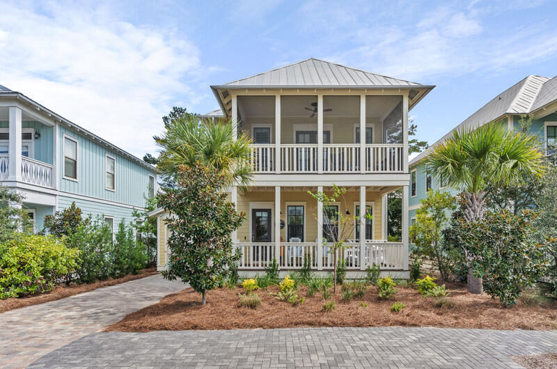 Welcome to 'Cabana Banana,' a fully furnished 4-bedroom, 2.5-bathroom beach home located in Lakeside at Blue Mountain Beach community along Scenic 30A. This meticulously maintained property combines upscale finishes with laid-back coastal charm, making it ideal as a primary residence, second home, or proven income-generating vacation rental. This home boasts an extremely impressive rental history, making it a great turnkey investment opportunity.

Interior highlights include hardwood and tile flooring, shiplap accents, designer lighting, and plantation shutters throughout. The open concept living area flows into a beautiful gourmet kitchen with quartz countertops, a custom tile backsplash, and a large center island perfect for entertaining. Outdoor spaces include a spacious front porch with swinging bed, a screened second-story porch, and a private backyard featuring a paver patio, grill, fire pit, and outdoor shower. The garage doubles as storage for all the necessary beach toys and golf cart while also home to an outdoor fridge and ping pong table.  

Lakeside at Blue Mountain amenities include a community pool, small community library/puzzle room, clubhouse, and scenic walking paths. Located just a short walk or bike ride to beach access, local shops, restaurants, and everything 30A has to offer.

Don't miss the opportunity to own this charming beach home in Blue Mountain Beach!