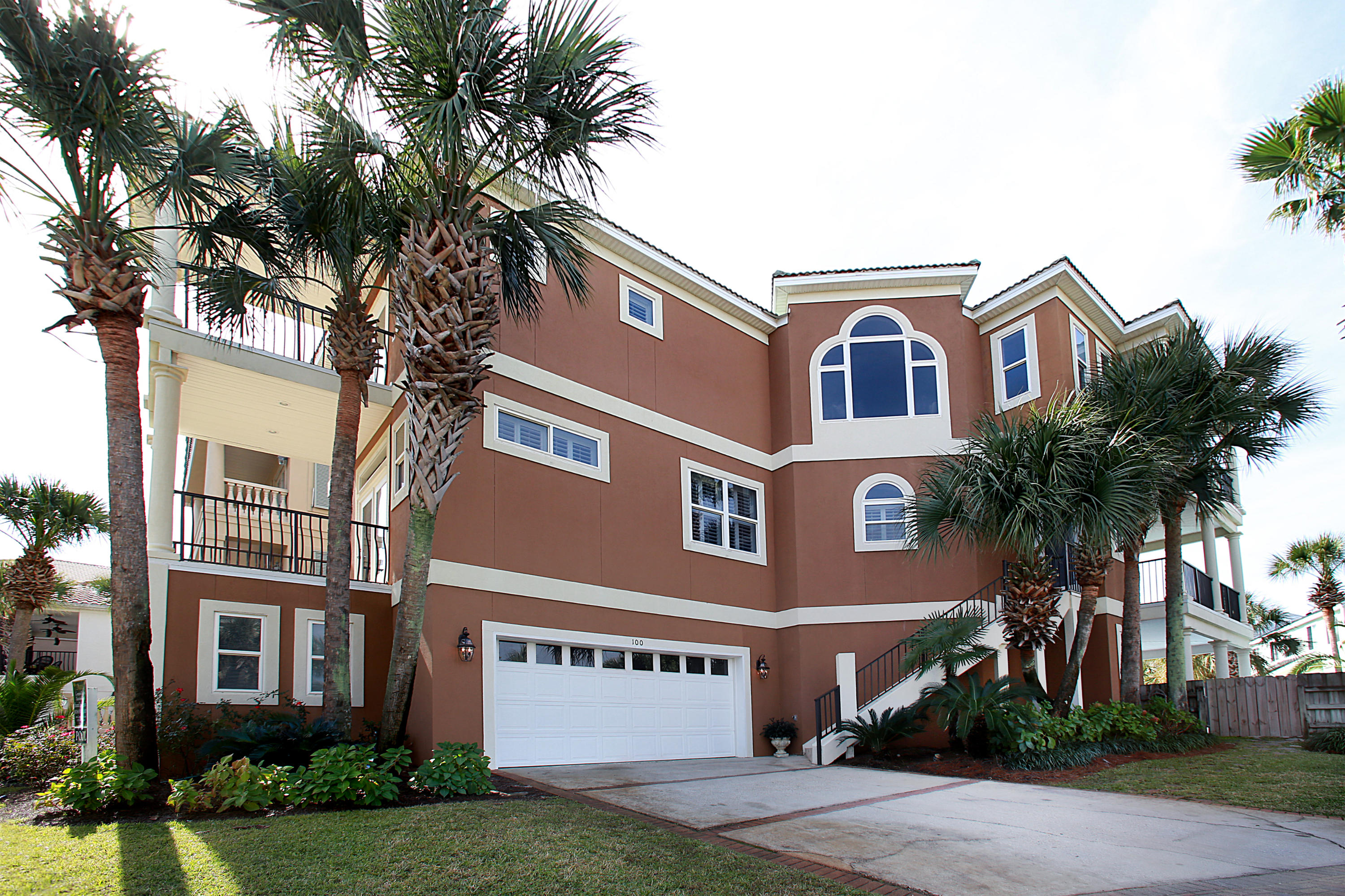 Updated Dunes of Destin coastal cottage with a private pool, a wealth of outdoor living space, and views of the community lake - all just steps from the beach. There are even Gulf views from the third floor balcony. With two master suites, three spacious guest suites, a main floor living area and a third family room, there is space for everyone, making this beach house especially suited for large families and multi-family gatherings. Guests can enjoy exceptional privacy, as each bedroom offers access to a private balcony or ground floor patio. Renovations include new cabinet doors and fixtures; fresh paint throughout; and new plumbing. Even with heavy owner usage, Updated kitchen features stainless steel appliances, granite counters, and a large breakfast bar. Perfect for entertaining, the living room and dual dining rooms, each with seating for six, are easily accessible to the kitchen. Offering immediate access to a balcony with outdoor seating that overlooks the pool, the living room provides a gas fireplace, built-in deep display shelves, two large cupboards, and a wet bar. United by a light-filled family room with a large arched window, the two master suites assume the third floor. Both master suites offer access to balconies, trayed ceilings, ample closet space, and en suites with spa amenities including jacuzzi tubs and separate showers. With updated appliances, clean lines, crown molding, arched windows and entries, columns, and 9' ceilings on the third floor, "Havana Daydreamin'" harmonizes modern elements with a traditional style. Dunes of Destin is an exclusive, gated community featuring private beach access, a community pool, a stunning lake with beautiful fountains and gazebos. Located in the heart of Destin, Dunes of Destin is close to shopping, dining and area attractions.
