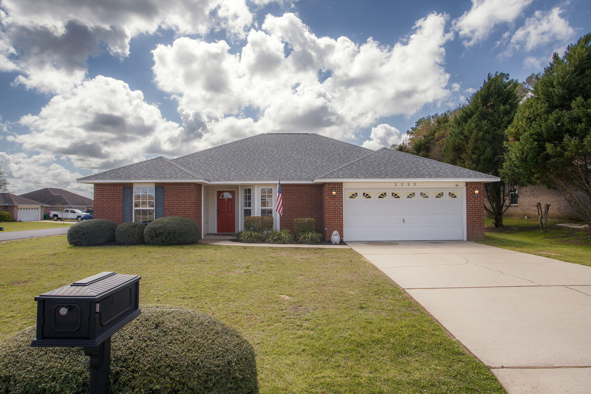 BUYER'S CLOSING COST PAID.. $15,000 LUXURY HOT TUB.. AND BRAND NEW FLOORING JUST INSTALLED!

Did I mention this lot is home to the elementary, middle and highschool bus stop? 

Welcome to 2233 Lewis Street! This 4 BR/2 bath BRICK HOME sits on a CORNER LOT with a PRIVACY-FENCED backyard and has a LONG LIST OF UPGRADES!

Step inside to open-concept design with  white walls, VAULTED CEILING, luxury vinyl plank flooring and numerous windows that flood the space with light!  

The Kitchen was recently transformed with NEW SS APPLIANCES (Bespoke Fridge 2025), NEW FARM SINK/FAUCET, NEW FIXTURES, 2 PANTRIES (1 in laundry room), SAGE CABINETRY and also features beautiful BUTTERFLY GRANITE COUNTERS. 

(continued) The designated dining area is quite spacious, and will accommodate large furnishings. The family room overlooks your EXTENDED PATIO AREA THAT FEATURES 6-PERSON LUXURY HOT TUB and custom firepit. We'll talk more about the exterior a little later.

The spacious Master Suite is private (split floorplan) with more luxury vinyl plank, walk-in closet, CUSTOM MAHOGHANY VANITY, refinished tub and NEWLY PAINTED MASTER BATH!

The 3 remaining guest bedrooms feature BRAND NEW CARPET, and boast NEW PAINT (2 bedrooms) AND NEW LIGHT FIXTURES!

The guest bath features NEW TOILET, NEW PAINT, LINEN CLOSET and SAGE BATHROOM CABINET with white solid surface counter. Check out the turtle tp holder!

The Laundry room offers 2 MORE BONUS ITEMS-- WASHER AND NEW DRYER WILL CONVEY WITH PURCHASE! Second pantry is located in laundry room.

Now let's head outside!

The owner extended the patio area, adding firepit and LUXURY HOT TUB! BONUS: PATIO FURNITURE ALSO STAYS! 

ANOTHER BONUS - LARGE STORAGE SHED ON CONCRETE PAD!

Attention Gardeners! This lot comes with a newly-planted Japanese Magnolia, and numerous berry plants (blueberry, 1 strawberry, 3 blackberry, 2 elderberry). #HappyGardening 

Other notable mentions: 30-YEAR ARCHITECTURAL ROOF (2022), TRANE HVAC INSIDE AND OUT (2017), COUNTY TAXES, NEIGHORHOOD PARK, 2-CAR GARAGE.. AND AS PREVIOUSLY MENTIONED-- BUYER CLOSING COST PAID!

Priced to move! Make an offer today!