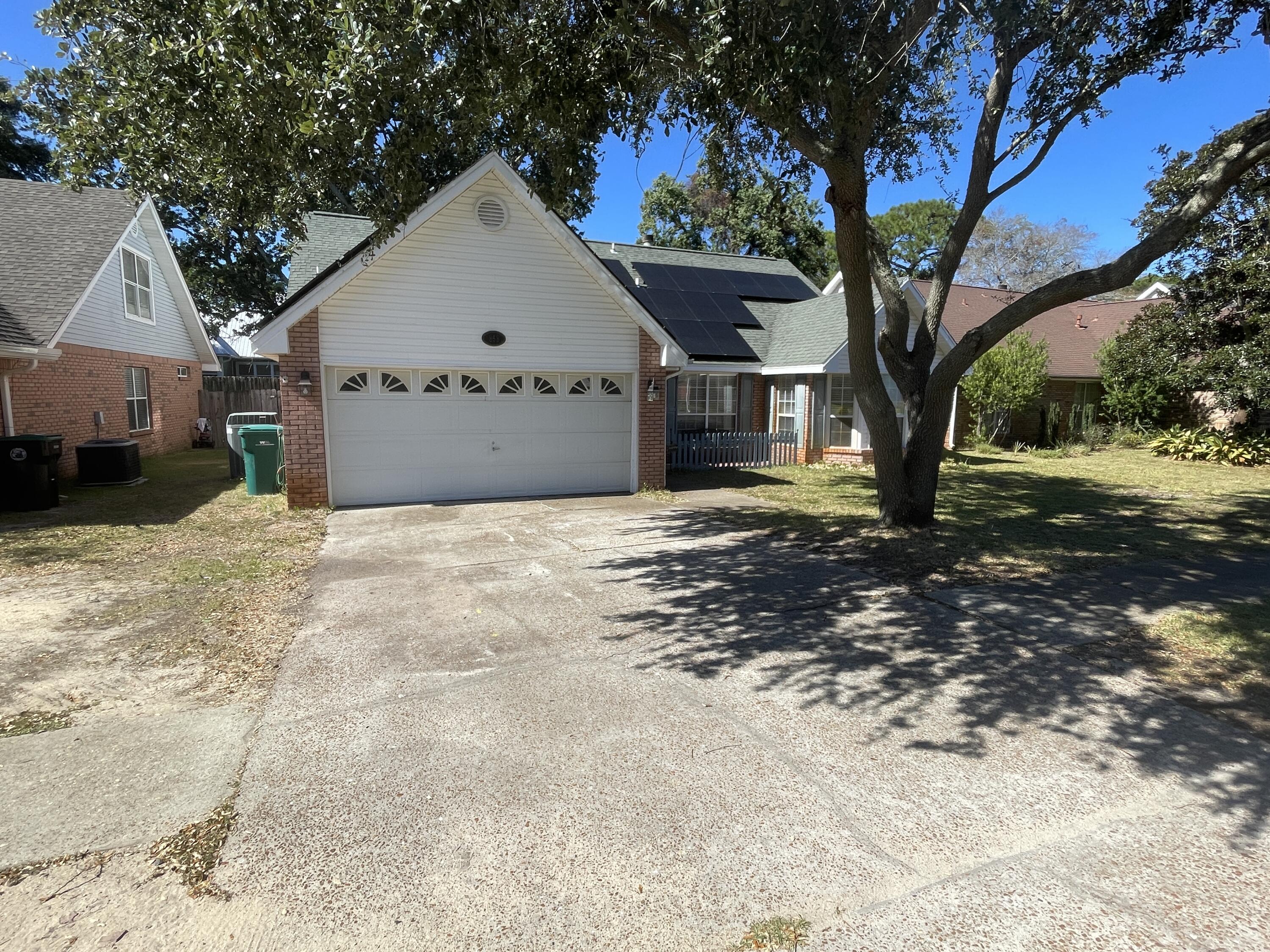 Move In Ready..This 4 bedroom 3 Full Baths in the Shalimar Commons community is only minutes away from the gate at Eglin AFB, a short walk to the public water access in Shalimar, and only 15-20  minutes from the emerald coast beaches.  NO CARPET...Recently updated with new LVP to replace carpet and remaining area has tile throughout.  2 Bedrooms and 2 Baths Downstairs and 2 Bedrooms 1 Bath up for ultimate privacy.  Solar panels will keep utilities to a minimum. Dogs may be considered on case by case basis with a non-refundable fee.  No Smoking or Vaping.