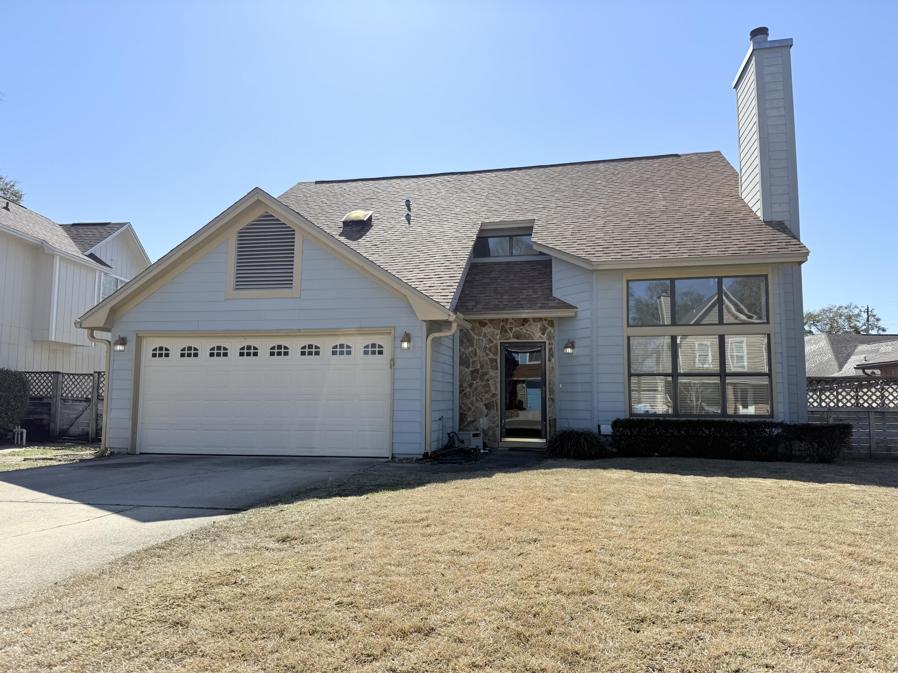 Updated 3 bed, 2.5 bath home in central Fort Walton Beach with quick access to Hurlburt Field and Eglin AFB. Inside features fresh paint, high ceilings, recessed lighting, tile and hardwood floors, plus new carpet. The living room includes a stone‑faced wood‑burning fireplace. The kitchen offers granite countertops, a breakfast nook, and new fridge and stove. A formal dining room, den/family room, laundry room, and half bath complete the first floor. Out back, enjoy a fully fenced yard and screened‑in porch.