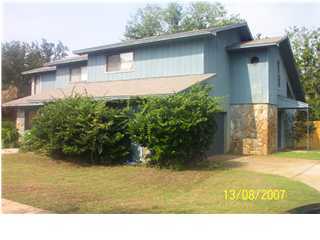 Unbelievable amount of space! Has an open floor plan for living/dining and kitchen area; cathedral ceilings in living room with a free standing fireplace; both bedrooms upstairs with private bathrooms; new fence for back yard to keep your pet inside. Up to medium sized pet allowed with non-ref pet fee.