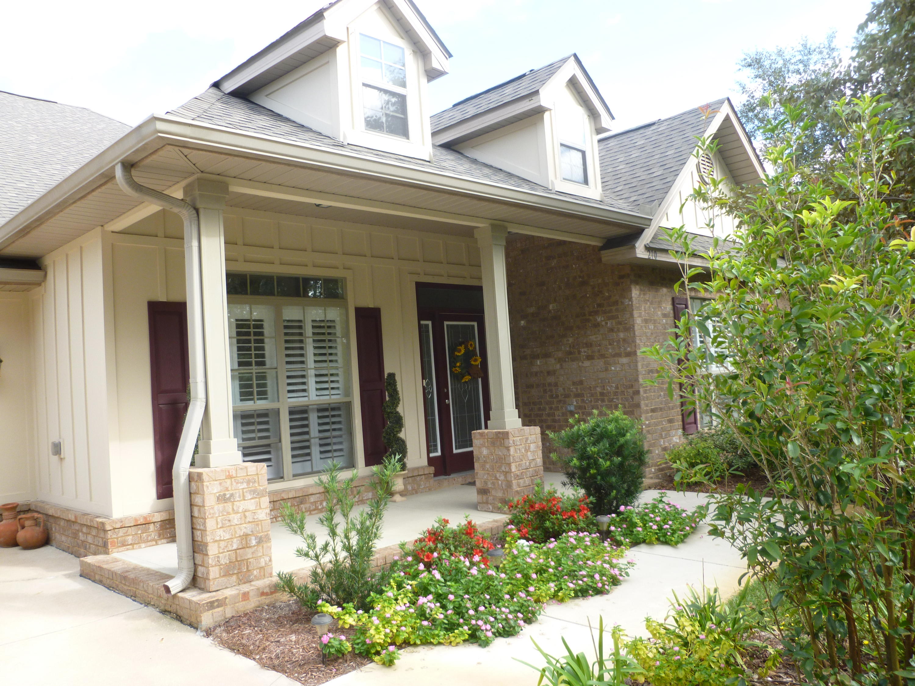 Gorgeous five-bedroom, three-full bath lakefront home in popular Whispering Lake! This spacious contemporary ranch boasts over 3,000 square feet of living space plus a large screened porch perfectly situated to enjoy the expansive view of the lake. With shopping around the corner and the Gulf only a five-minute drive away, this home will amaze you for the money! The large entry foyer opens to a spacious and bright living room/study and formal dining room. The fantastic kitchen with granite counter tops, abundant cabinets, LG and Samsung stainless appliances, enormous walk-in pantry and large dining area opens to a huge great room with a trey ceiling. There are three separate bedroom wings for ultimate privacy! The master suite features a spacious walk-in closet, large vanity with dual sinks, garden tub and separate shower.  Each additional bedroom wing features two bedrooms and a full bath.  This home's features include crown molding, engineered wood flooring in multiple rooms, 20" tile in the kitchen and wet areas and a tubular skylight in the kitchen/great room area. A spacious two-car garage, large driveway and an irrigation system on a private well complete this beautiful property.  This great home won't last long!  Buyer to verify all dimensions.  Listing broker/salesperson has an ownership interest in the property.