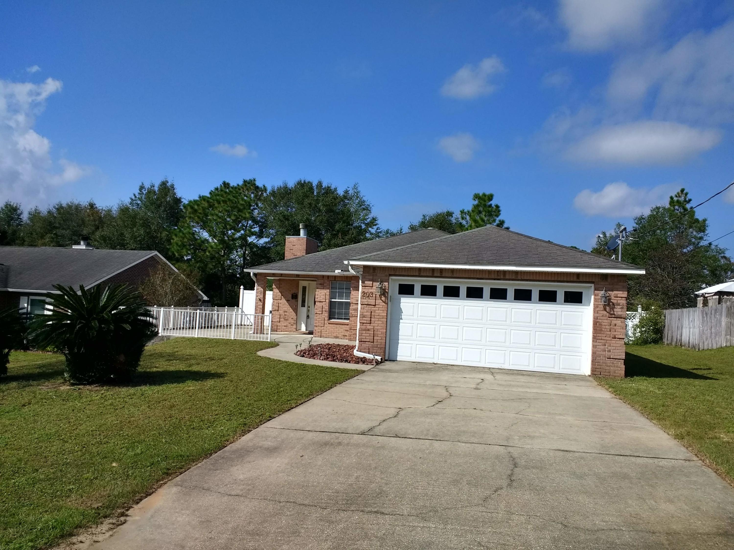 GREAT LOCATION!! South of I-10!! This 3BR/2B, 1753sf, all brick home with large back yard. The house features tiled flooring throughout, open floorplan, fireplace, check out the kitchen w/island, cabinets & stainless appliances. Master suite with double vanity, whirlpool tub and walk-in closet. Two other bedrooms with hall bath between. Inside laundry- washer & dryer there - if needed. Privacy fenced back yard and small dog may be considered with approval. SEE MORE.... Additional large room in the back yard with separate bath that could be used for many things.  Call for an appointment.
