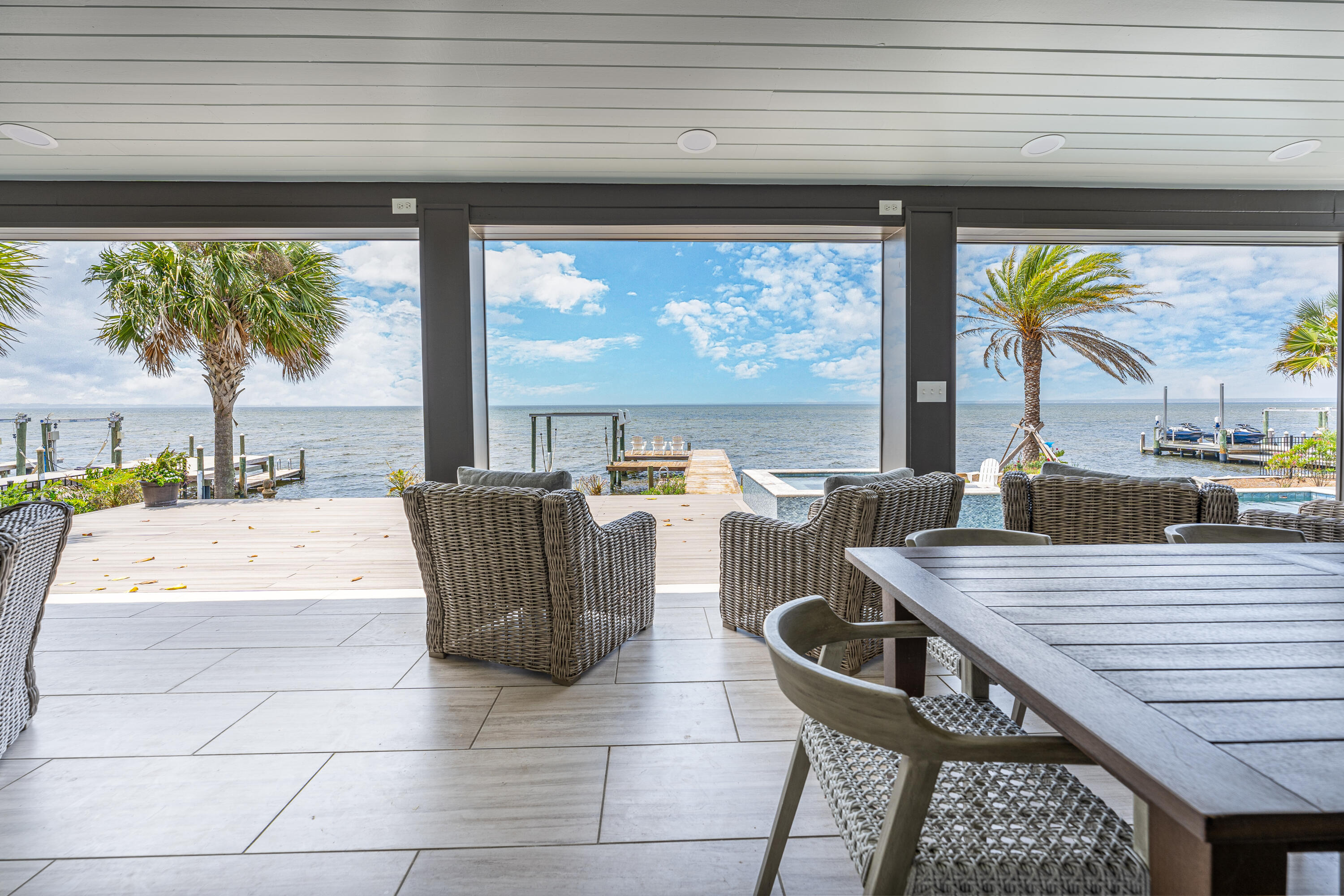 Bay Front Estate  in Burnt Pine Behind the Private Gates of Sandestin Golf & Beach Resort. Home Sits on a 104 Ft. Wide Lot near the End of a Cul De Sac on Bay Estates Circle. Home has Undergone Massive Renovations Inside and Out with Hardwood Floors throughout the First Floor of the House.
New Custom Pool, Spa, Summer Kitchen, Porch and Fire Pit were also Recently Added. Private Main Floor Bedroom with His & Her Closets, New Bathroom, Fireplace and a 2nd Bedroom Suite are located on the First Floor. 
Renovated Spacious Kitchen with Quartz Counters and Top of the Line Appliances Opens to the Sun Room and Expansive Living Room.  2nd Floor has a Theater Room for 12 to Watch All the Games and Movies, Along with 5  Guest Bedrooms Each with Their Own Bath.