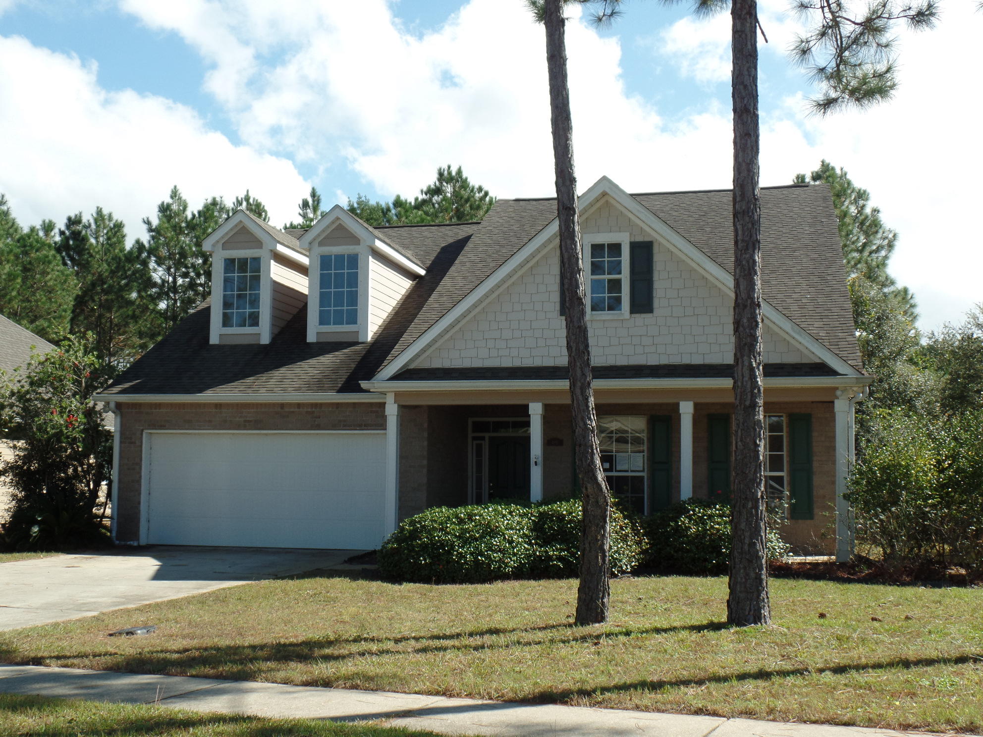 REO. List Price is $149,900. This is a lovely 1,893 SF 3 bedroom 2 bath home in Hammock Bay's Symphony community. The main living area is spacious and bright and has a nice fireplace and vaulted ceiling. The kitchen features lots of cabinet space, stainless appliances, corian counter tops and it opens to the living room across a spacious breakfast bar. The split bedroom floor plan allows for added privacy to enjoy your expansive master suite with trey ceiling and walk in closet. The master bath has a garden tub, double vanity and separate shower. There is a nice sunroom off of the main living area with access to the screened patio overlooking the spacious back yard. Hammock Bay offers lots of great amenities including a spectacular pool, tennis, dog park, walking trails, & so much more.