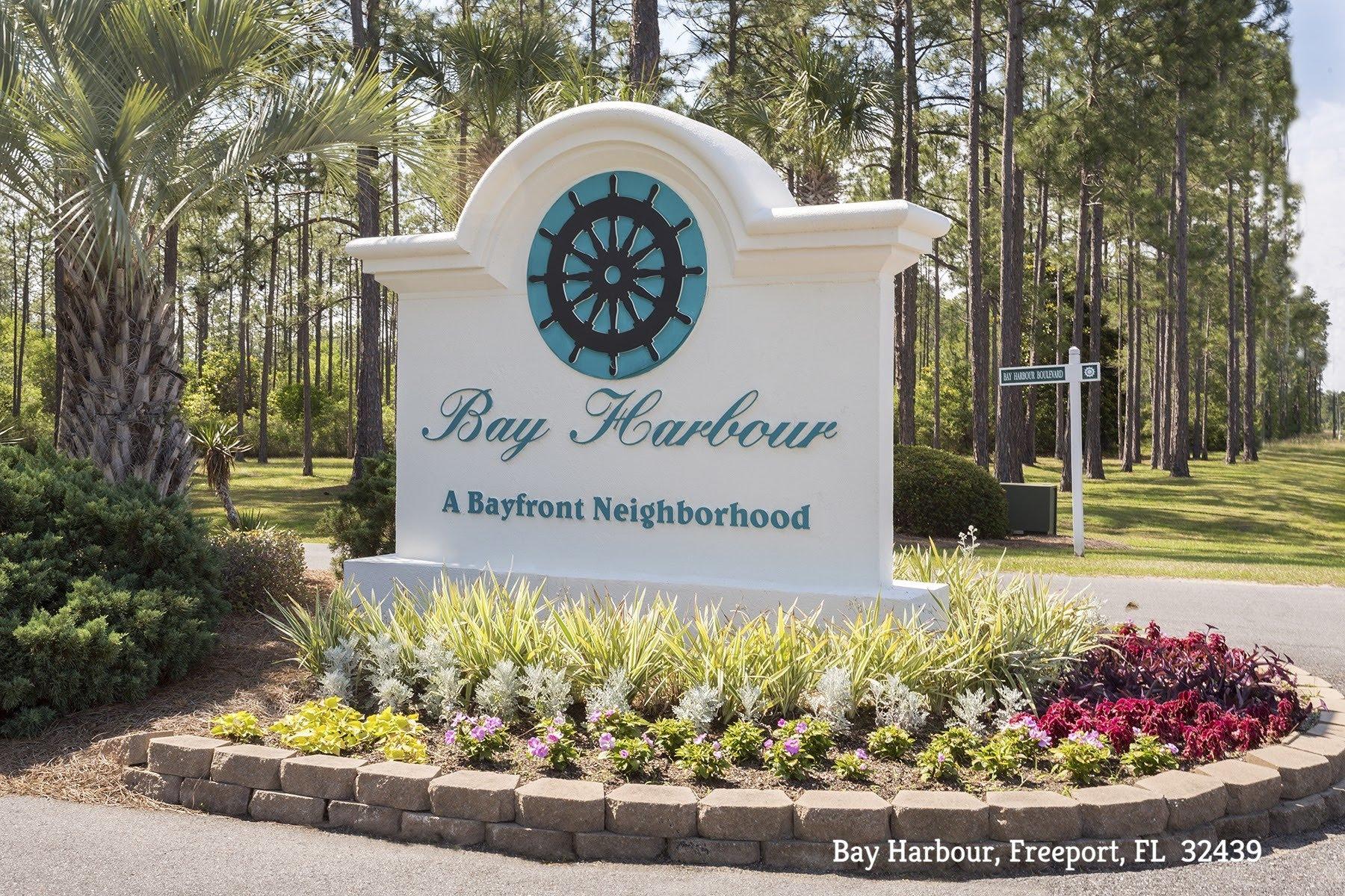 Partial Tap Fees Paid! LOW HOA fees! Dont miss this High and Dry half acre lot available in the highly sought after community of Bay Harbour.  Build your dream home steps from the bay and enjoy open spaces with large lots and plenty of green space.  Community dock, pier, tennis and storage make this a great neighborhood to enjoy your bay side lifestyle!