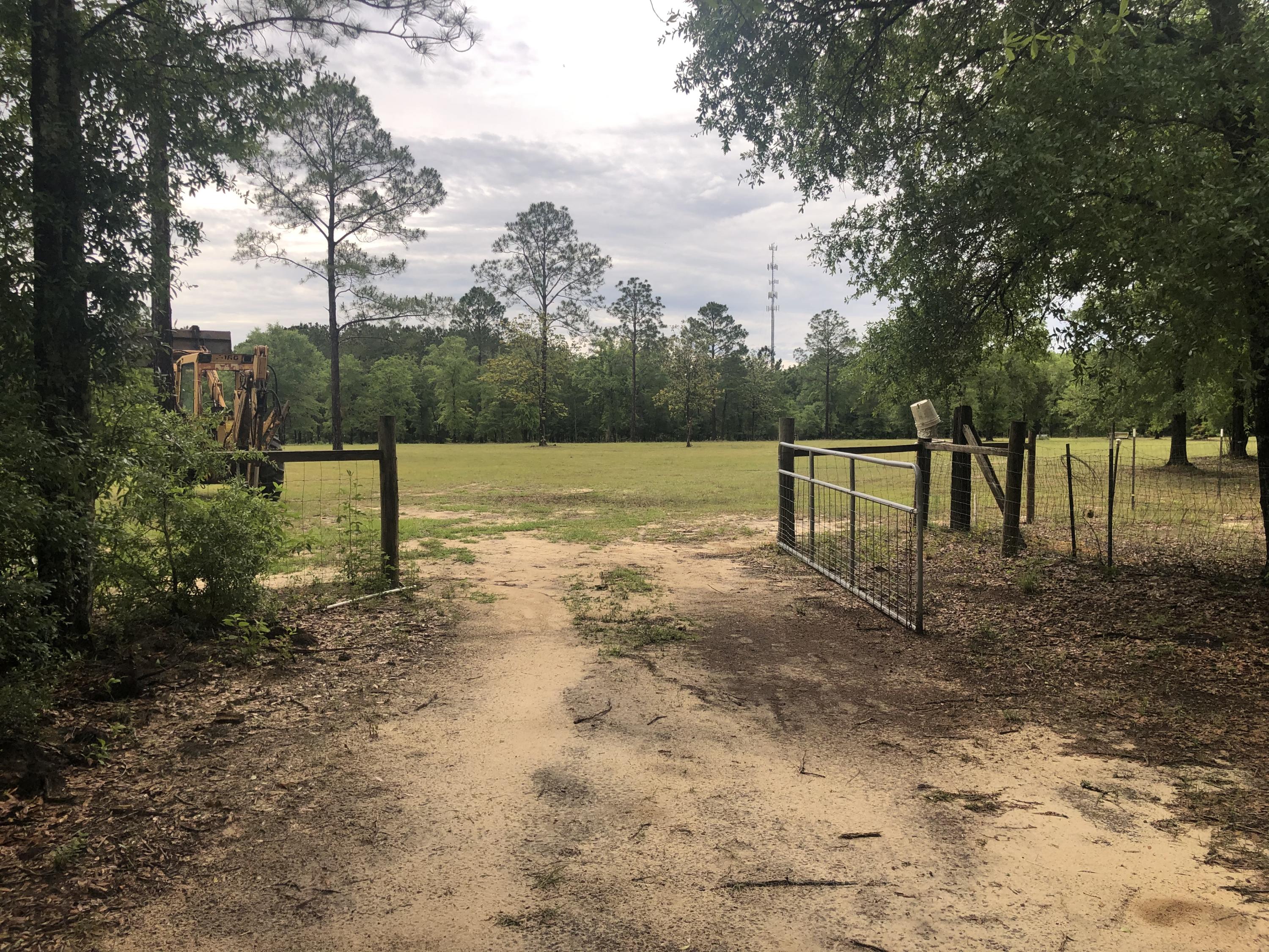 Beautiful 16 acres, located off Hwy 90. Easy access to Baker and Crestview for schools and shopping. Land is mostly cleared and ready for you to build your new home. Great cell phone coverage! 
Buyer to verify all dimensions and all pertinent information.