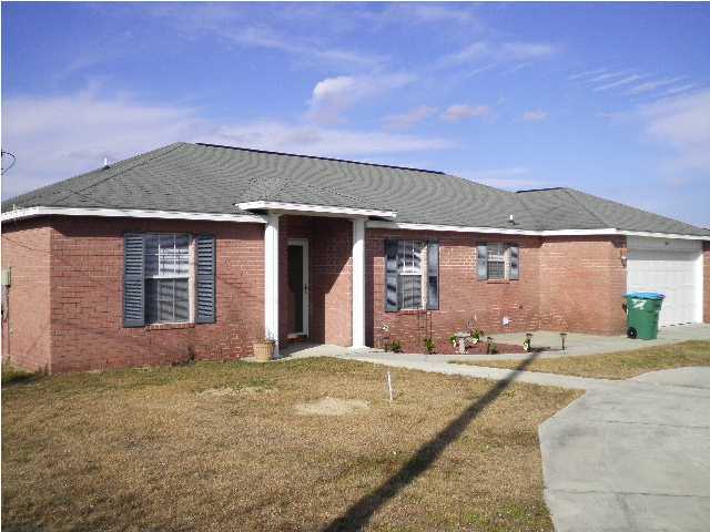 South of I-10! Call today to see this 3BR/2BA brick house with circle driveway, 2 car garage, privacy fenced yard with sprinklers, open patio, large living room, kitchen w/ breakfast nook and all the appliances, formal dining area, split bedroom plan w/ master bedroom and bath w/ garden tub, separate shower, two walk-in closets, double vanity. Large inside utility room w/ room for extra storage. Small pet considered.
