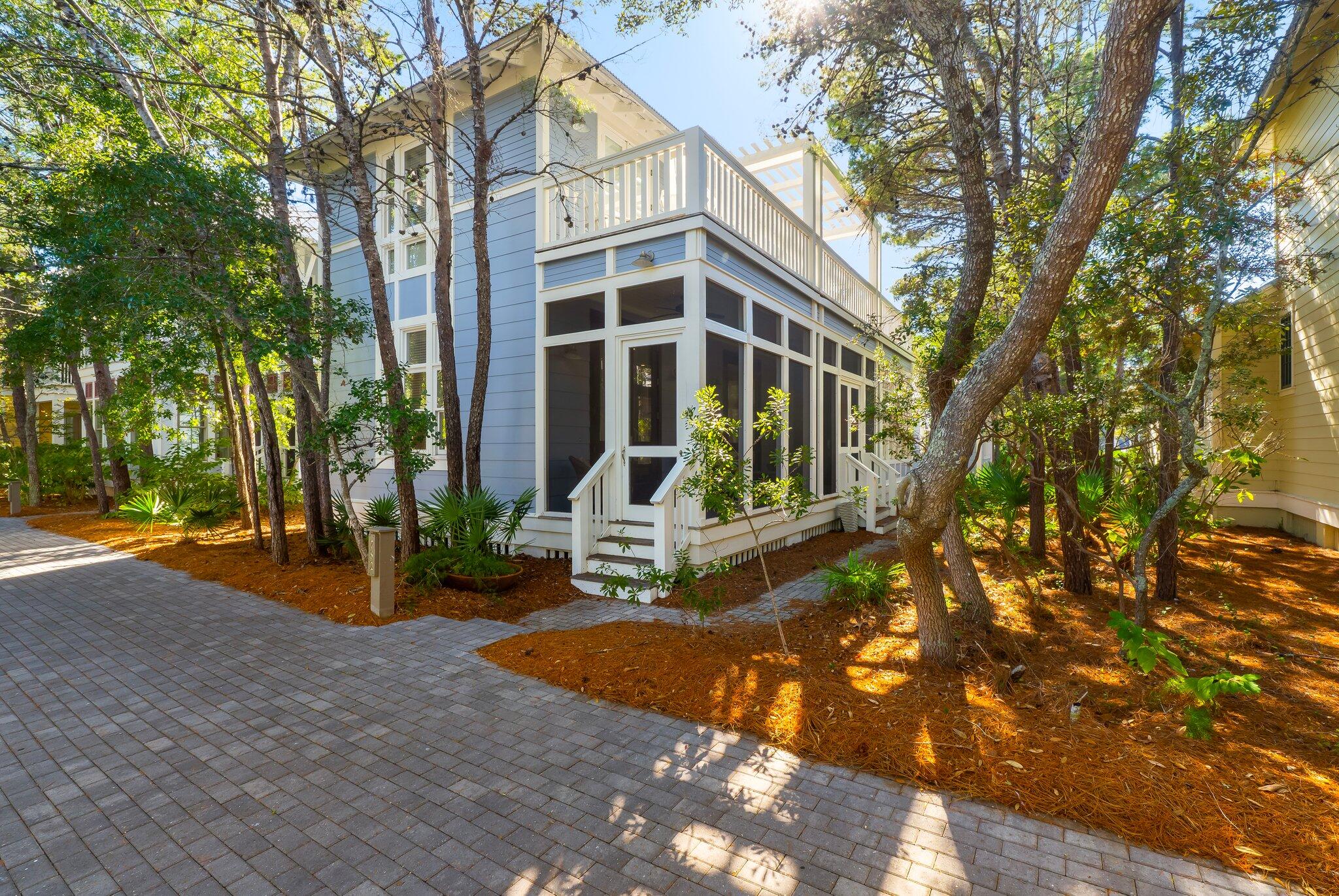 Welcome to 782 Western Lake Drive, a custom-designed coastal retreat in the coveted Lake District Phase I of Watercolor! Built by Ralph Gage Contracting with superior structural integrity, this stunning 3-bedroom, 4-bathroom home has been recently renovated to offer the ultimate luxury and comfort.

Step inside through one of three elegant 10' custom Mahogany double doors to discover an open-concept living space with 11' ceilings, hardwood floors, and beautifully tiled baths. The updated kitchen boasts gorgeous countertops, custom-built cabinetry, and a seamless flow to the dining and living areas, which open onto a screened porch—perfect for entertaining indoors and out. Upstairs, two additional bedrooms with private baths and a versatile bonus/media room provide ample space for family and guests. This home comfortably sleeps 10, making it ideal as a primary residence, vacation home, or rental property.

Additional features include a two-car garage with enclosed storage, attic space, and sitting areas on both levels for cozy gatherings.

Located in WaterColor's highly sought-after Phase I Lake District, this home is steps away from the beach, WaterColor Beach Club, tennis courts, the BoatHouse, and the vibrant Seaside town center. Residents enjoy various amenities, including Gulf-front and lakeside pools, nature trails, canoeing, and easy local shopping and dining access.

Embrace the relaxed coastal lifestyle in one of WaterColor's most desirable neighborhoods, where muted color schemes blend seamlessly with the natural surroundings. Don't miss this rare opportunity to own a piece of paradise!