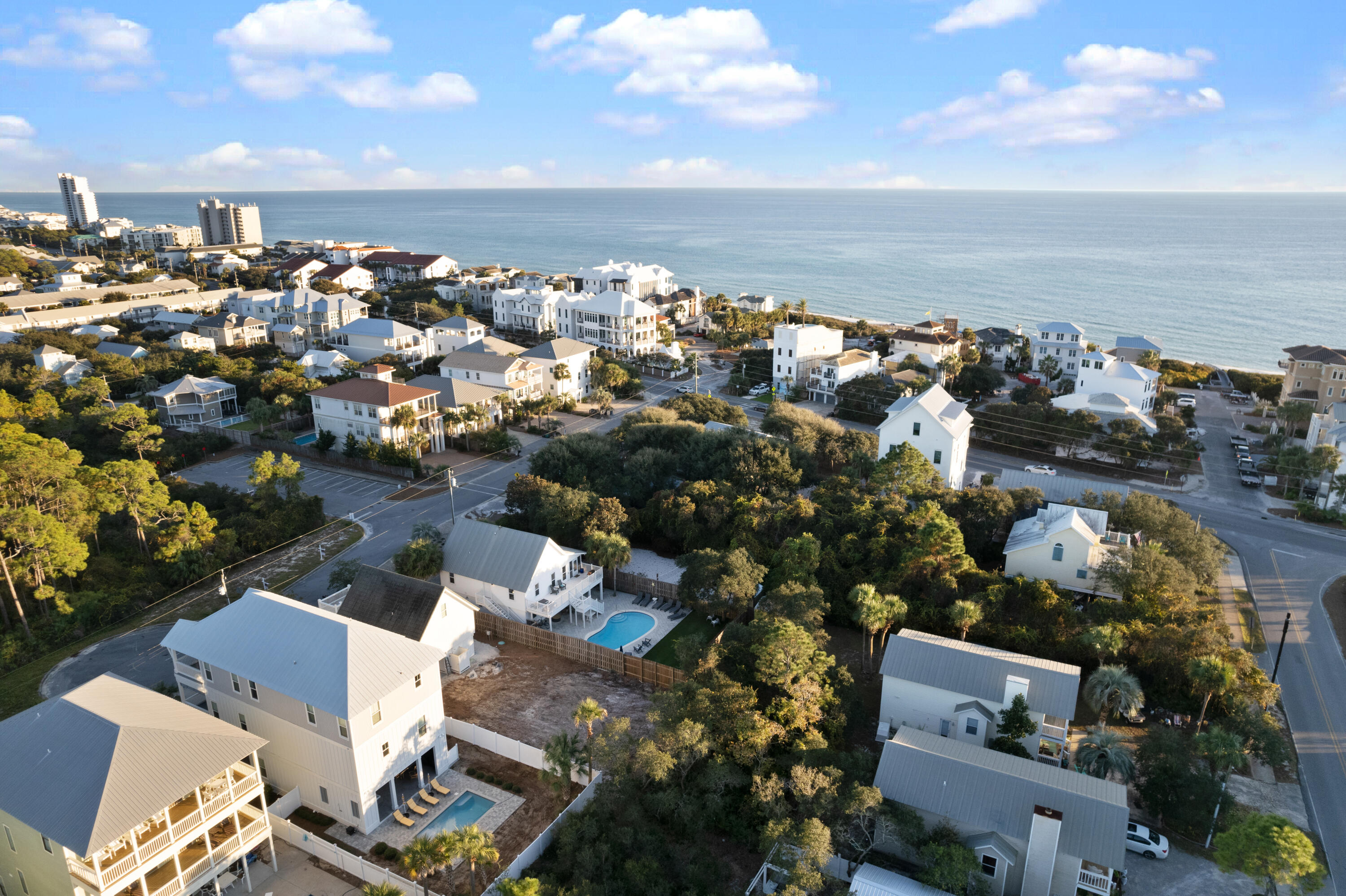 Ideally located in the heart of Seagrove Beach off Scenic HWY 30A, 59 Santa Clara offers a true oasis. Situated within a few steps of the sugar white sands and emerald waters, this property showcases two separate units.  Positioned less than one mile to iconic Seaside, FL; the main unit offers three bedrooms and two full bathrooms on the second and third floor; while the second unit contains two bedrooms and 2 bathrooms. The outdoor retreat is highlighted by a large newly plastered private pool, 500 square feet of screened porches and ample additional outdoor living. Features of the property include vaulted ceilings, new windows, designer flooring, quartz countertops, built-ins and stainless steel appliances. Comfortably sleeping sixteen and boasting large renal income potential, this property offers the opportunity for a fantastic investment property, second home or permanent residence. Future homeowners will have access to enjoy the 30A lifestyle within minutes of their doorsteps. World-class shopping, dining and entertainment are found only a short walk from the home.