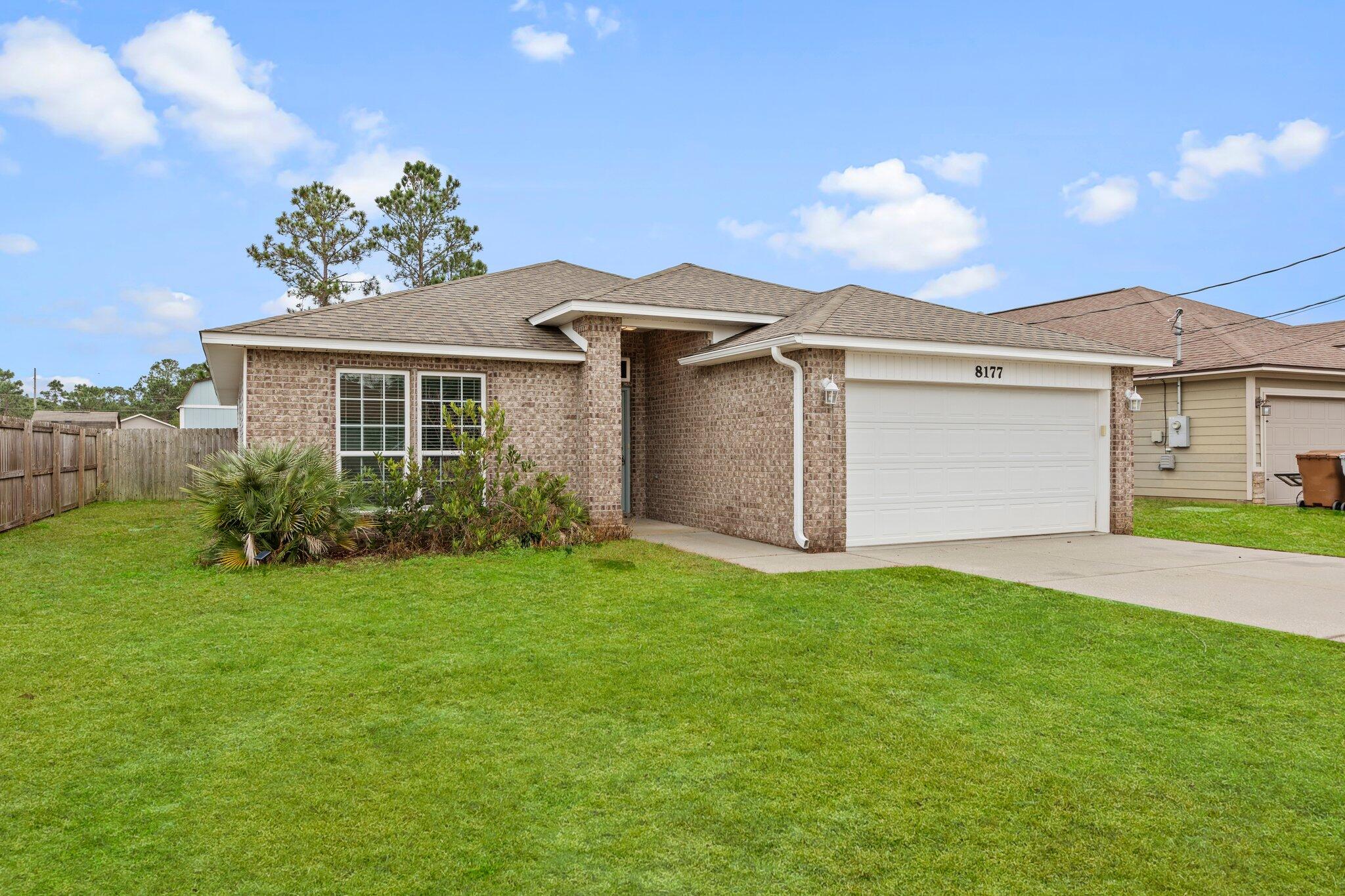 Welcome to this beautiful 3-bedroom, 2-bathroom home located in desirable Navarre, FL. This home offers a modern and stylish living experience with its stunning granite countertops and sleek stainless steel appliances. The spacious and open floor plan is enhanced by the luxurious LVP flooring, providing a contemporary and low-maintenance living space. Step outside onto the covered patio and enjoy the fresh air while taking in the serene surroundings. Additionally, this home offers the convenience of an outdoor storage shed, perfect for storing your belongings. With its prime location and desirable amenities, this home is sure to provide a comfortable and enjoyable living experience. Don't miss out on the opportunity to make this house your home. Contact us today to schedule a tour and see all that this home has to offer.