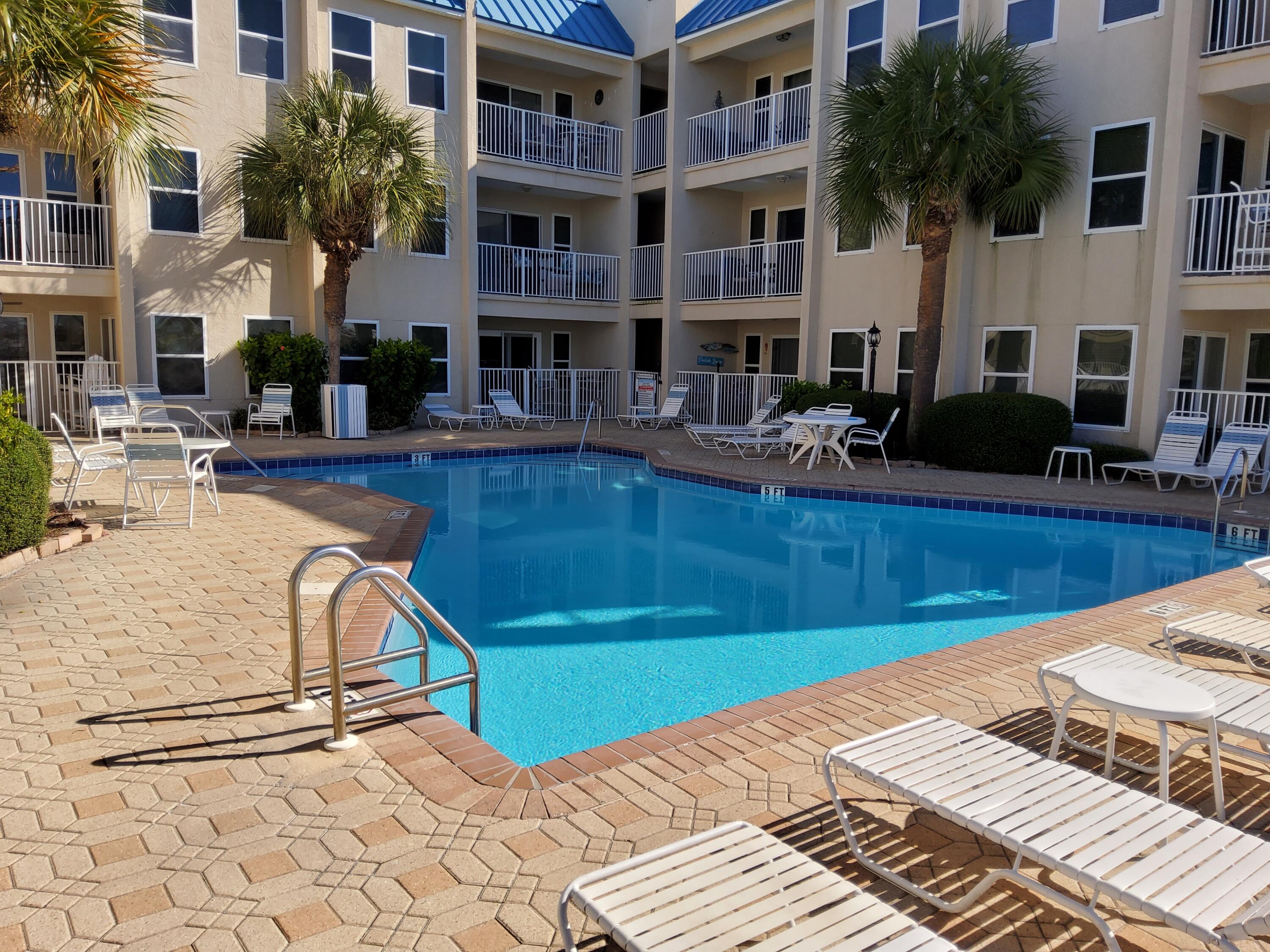 POOLSIDE VILLAS CONDO - Residential