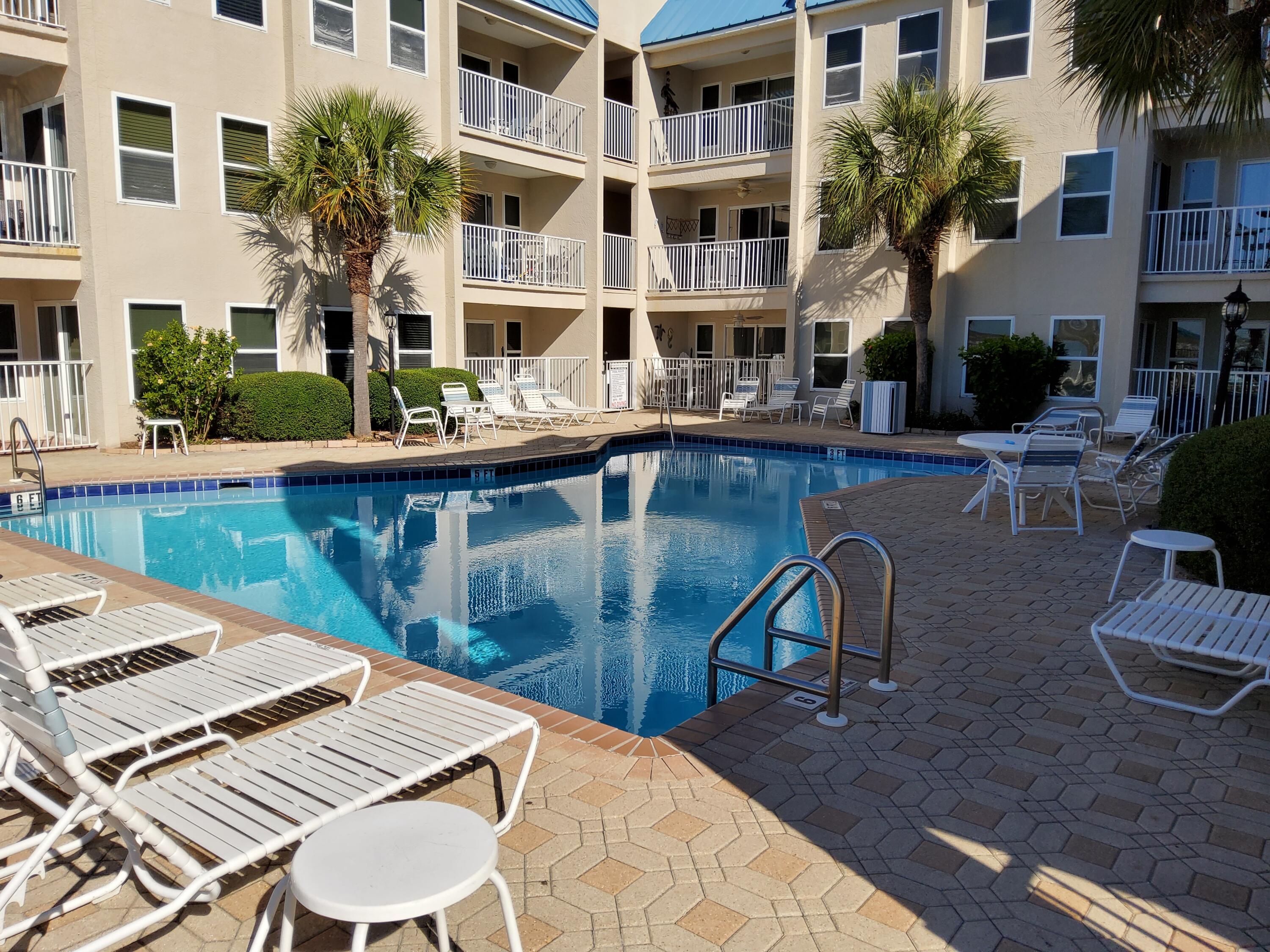 POOLSIDE VILLAS CONDO - Residential