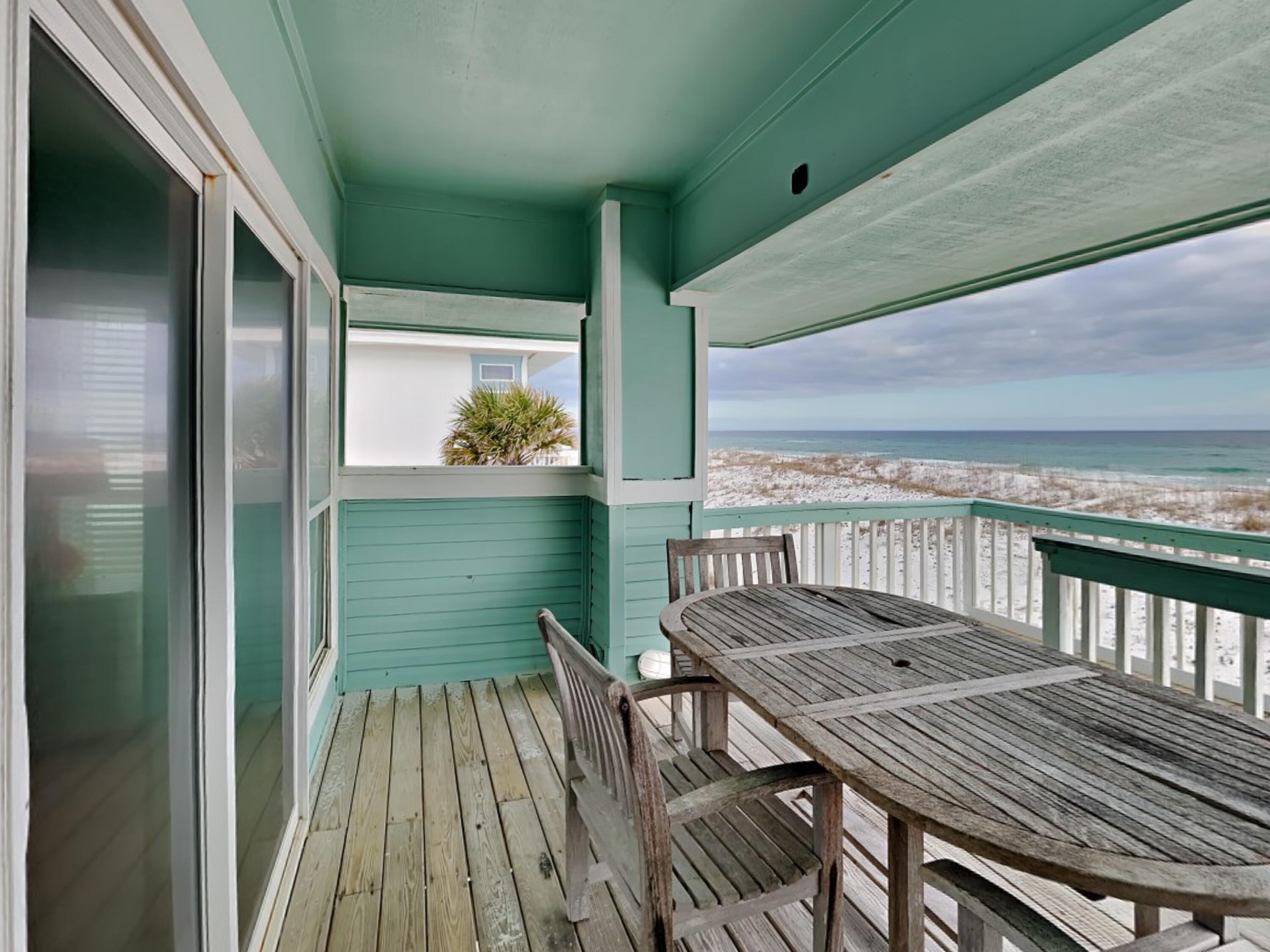Step into your own slice of paradise with this 6-bedroom, 6-bath Gulf-front residence on Pensacola Beach. Fully furnished and turnkey, this amazing retreat offers ample space for up to 18 guests, making it the perfect destination for a beach escape or a savvy investment opportunity. The 110' +/- of gulf front provides an incredible setting and the layout is ideal for memorable gatherings. This coastal retreat offers versatility for any occasion, whether hosting family reunions, intimate beach weddings, or rejuvenating retreats. With a layout designed for seamless gatherings, enjoy panoramic vistas of the Gulf from every angle. Unparalleled views of the Gulf from this prime beachfront property are indescribable, where they are paired perfectly with soothing sounds of emerald waves. Start your day with a breathtaking sunrise from the private balcony and end it with evening barbecues on the expansive patio, all while never losing sight of the mesmerizing Gulf. Indulge in the luxury of a fully equipped, state-of-the-art kitchen, allowing you to whip up a fresh catch with ease. The living room serves as the perfect spot for game nights or family gatherings. Each bedroom is thoughtfully appointed for restful nights, while the bathrooms feature jetted tubs and walk-in showers for ultimate relaxation. Venture outside to enjoy direct beach access via a convenient walkway, ideal for paddle boarding, snorkeling, or simply soaking in the sun. Covered parking, outdoor entertainment areas, and additional storage space further enhance the allure of this coastal haven. With its unbeatable location, amenities, and boundless opportunities for both relaxation and adventure, this Pensacola Beach retreat invites you to embrace the quintessential beach lifestyle. Start making memories and living your beach life today!